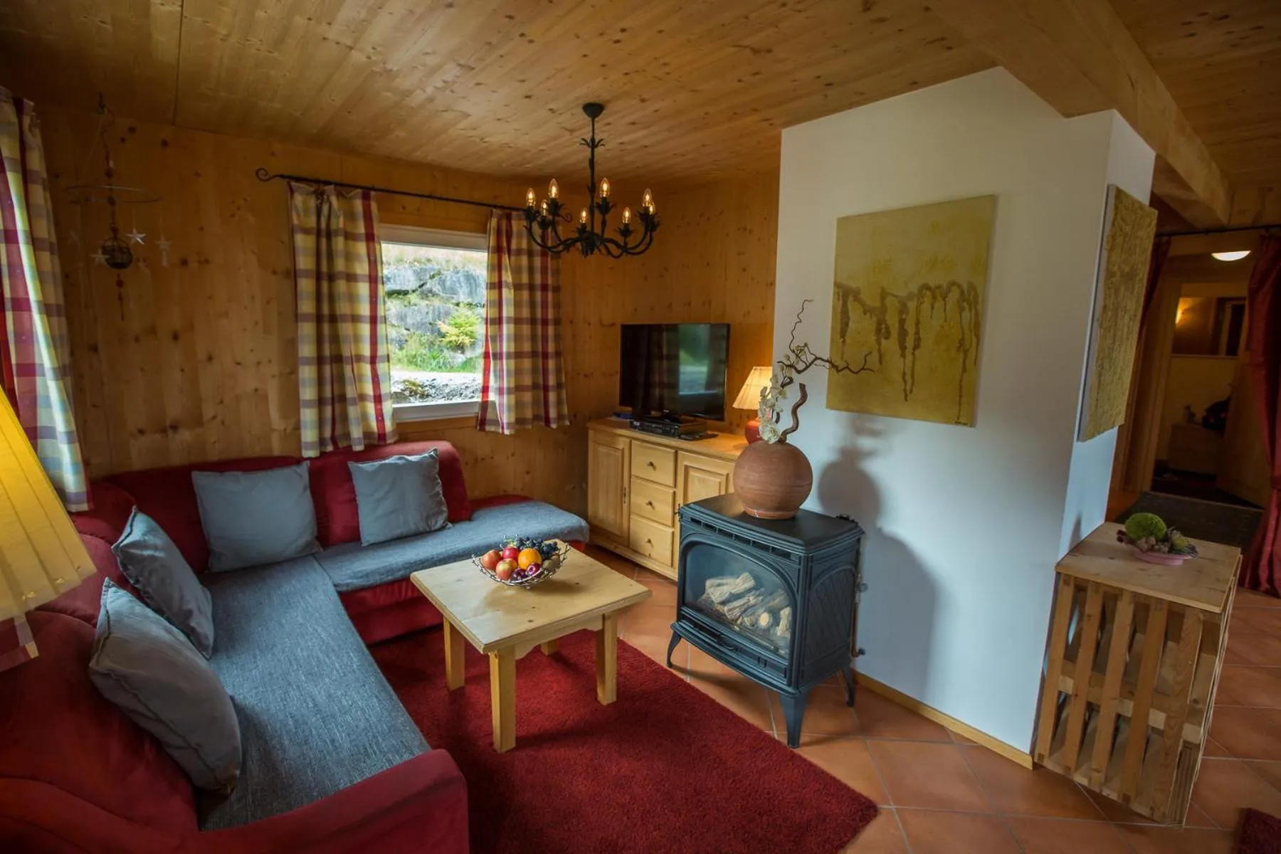 Living room in Alpendorf Dachstein West by ALPS RESORTS