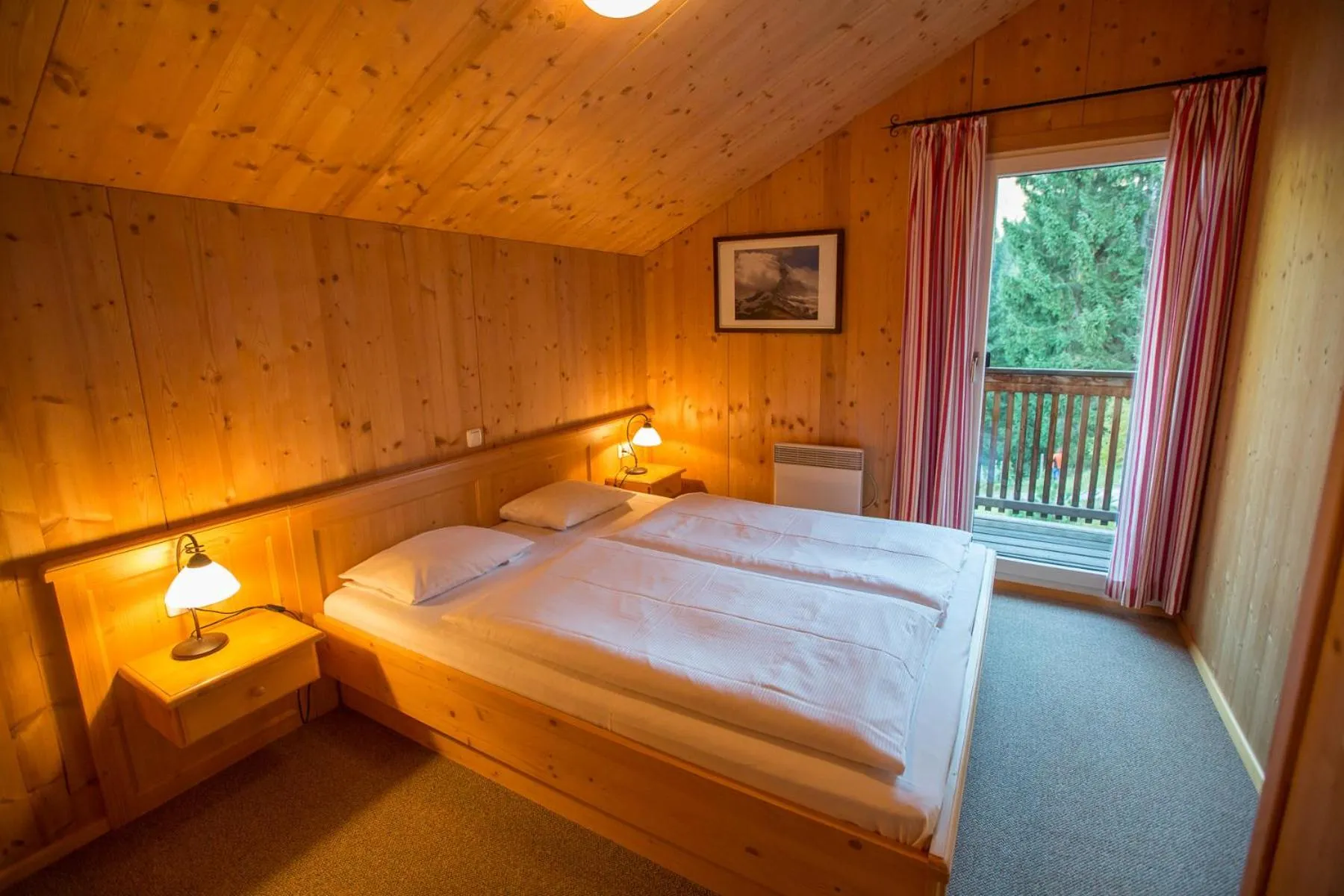 Bedroom, Bed in Alpendorf Dachstein West by ALPS RESORTS