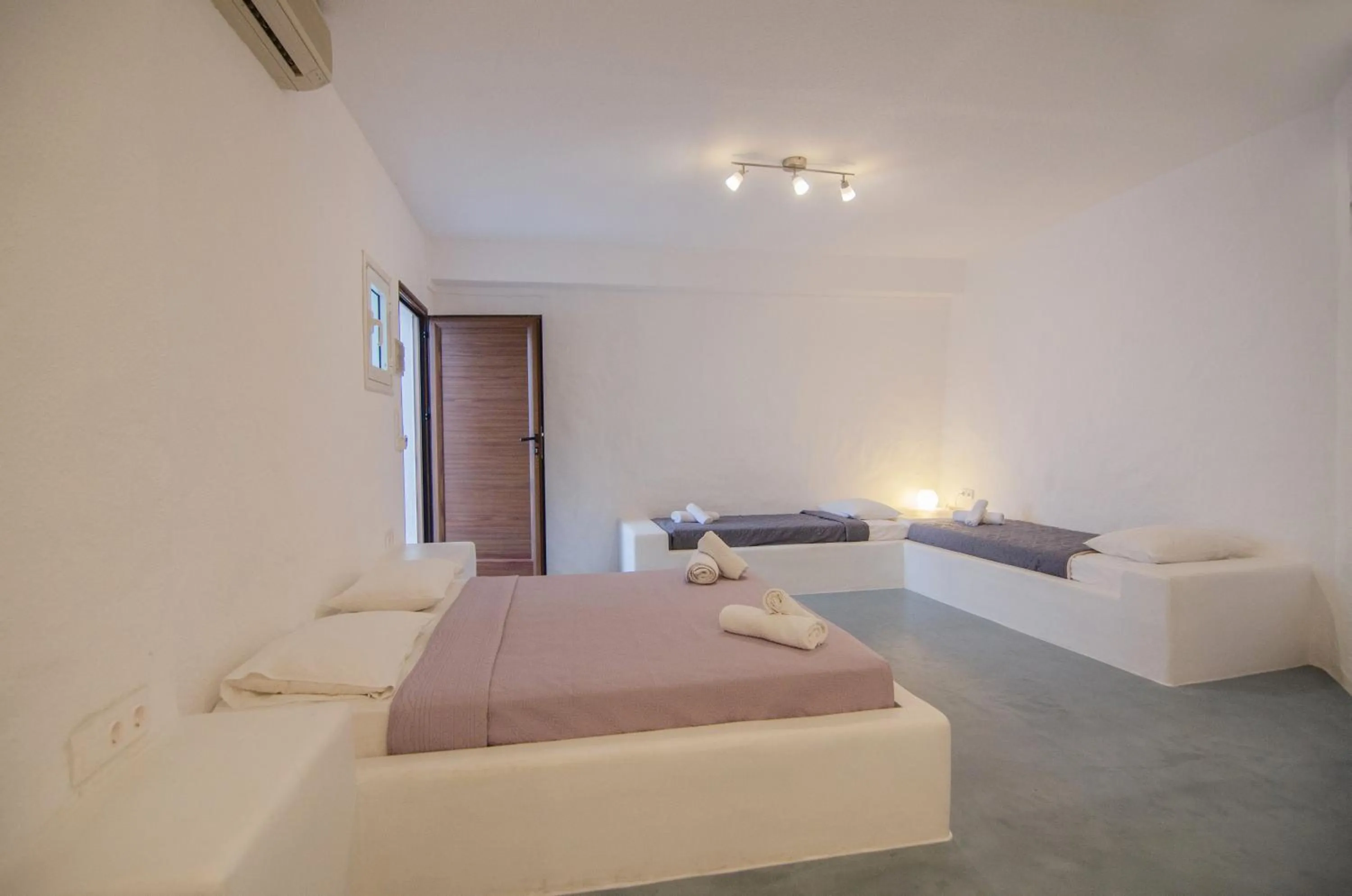 Bed in Sunrise Hotel