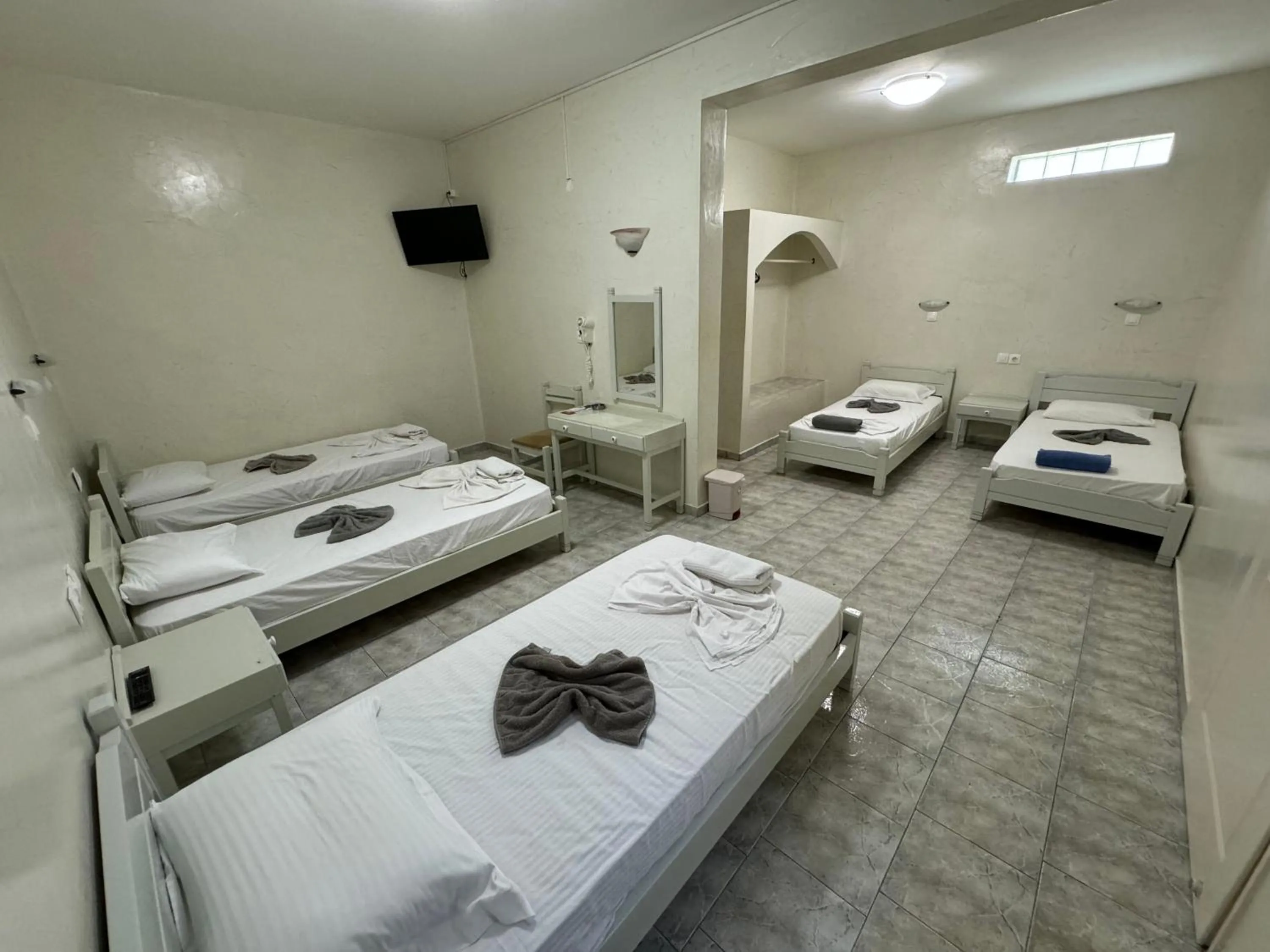 Bed in Sunrise Hotel