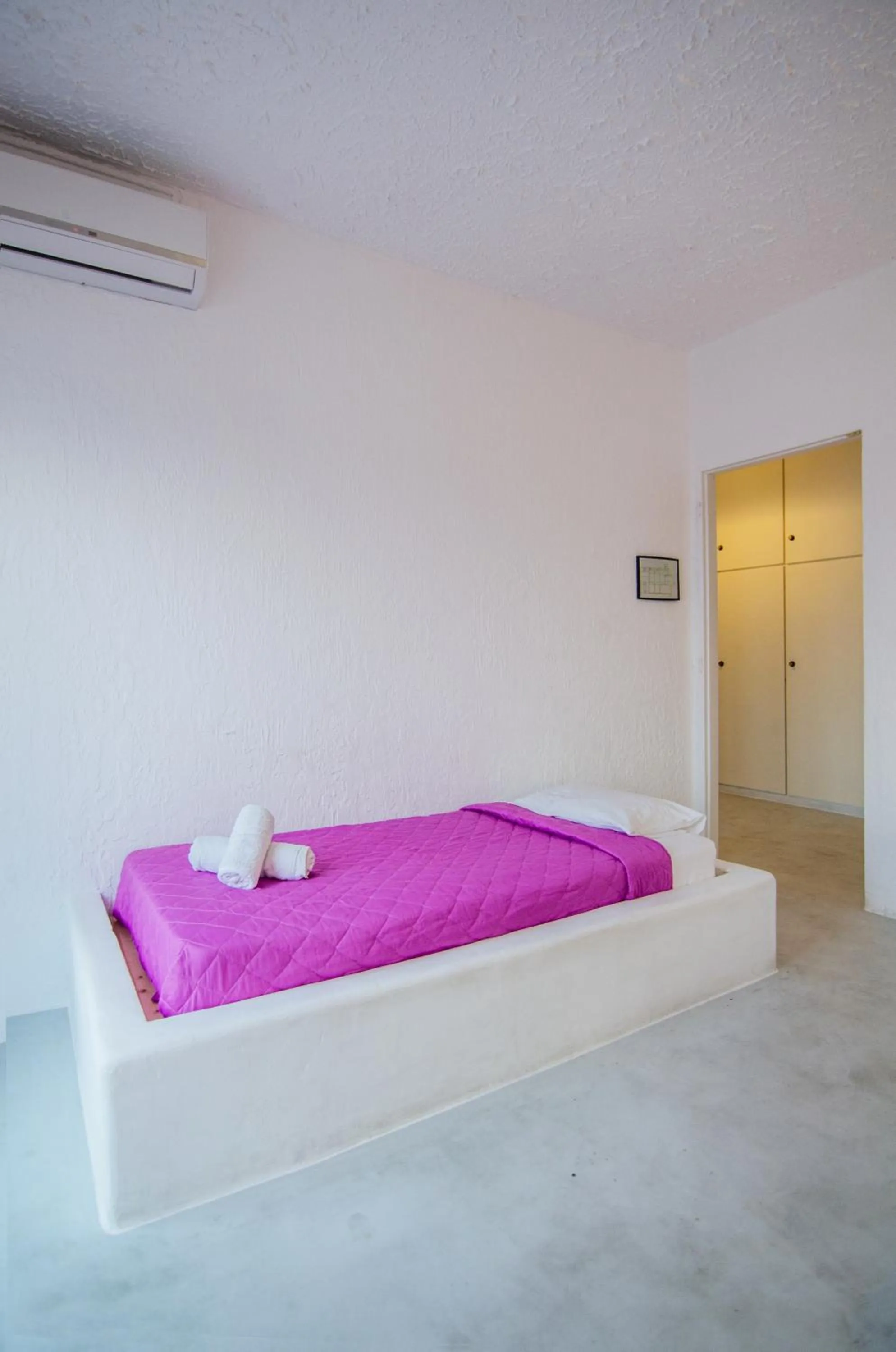 Bed in Sunrise Hotel