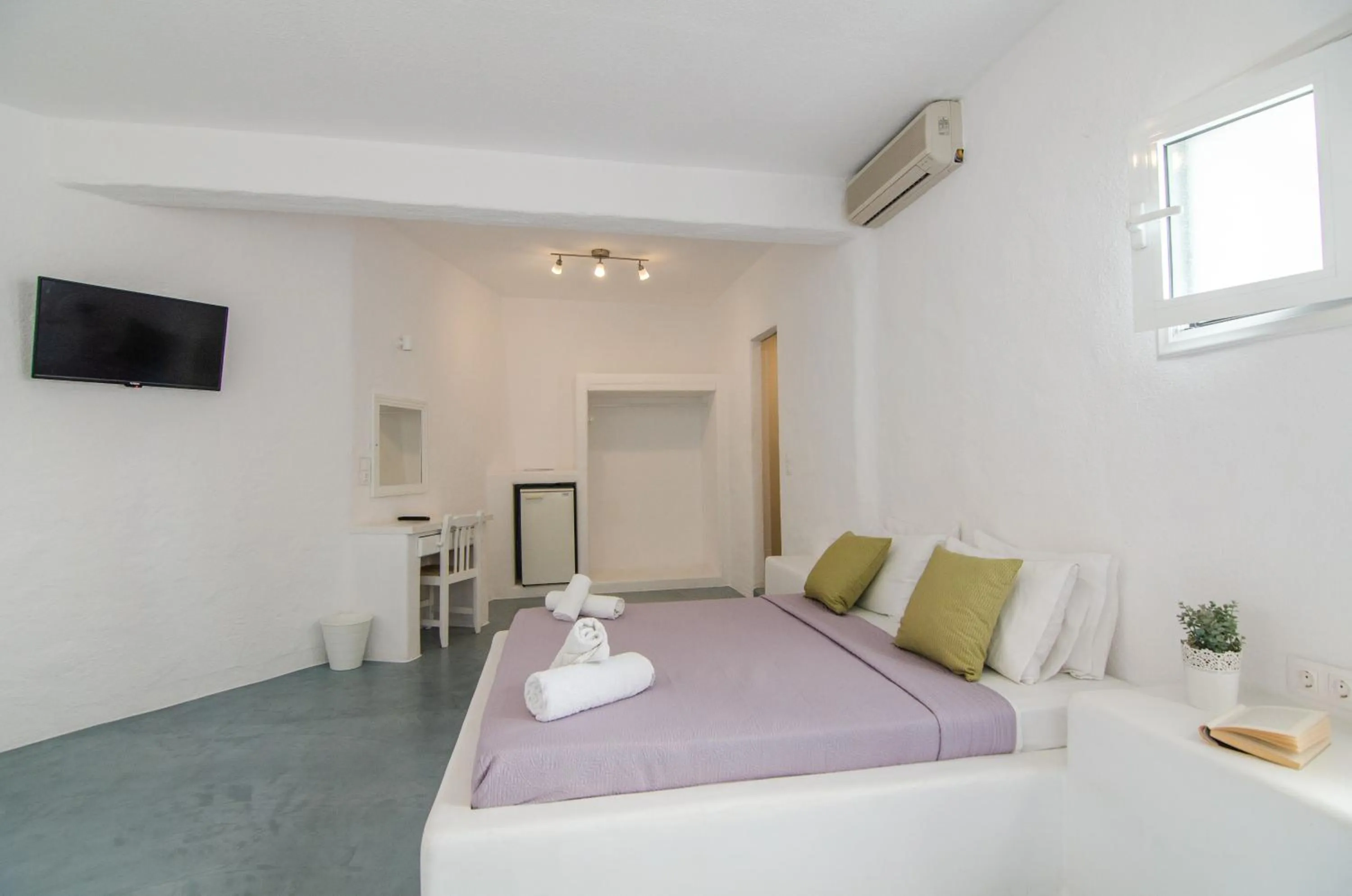 Bed in Sunrise Hotel