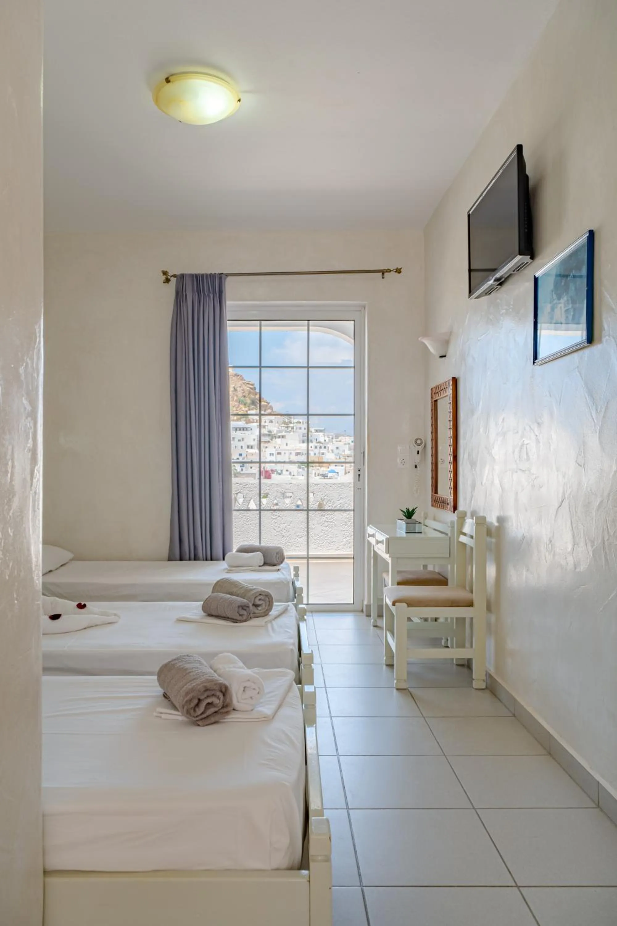 Bed in Sunrise Hotel