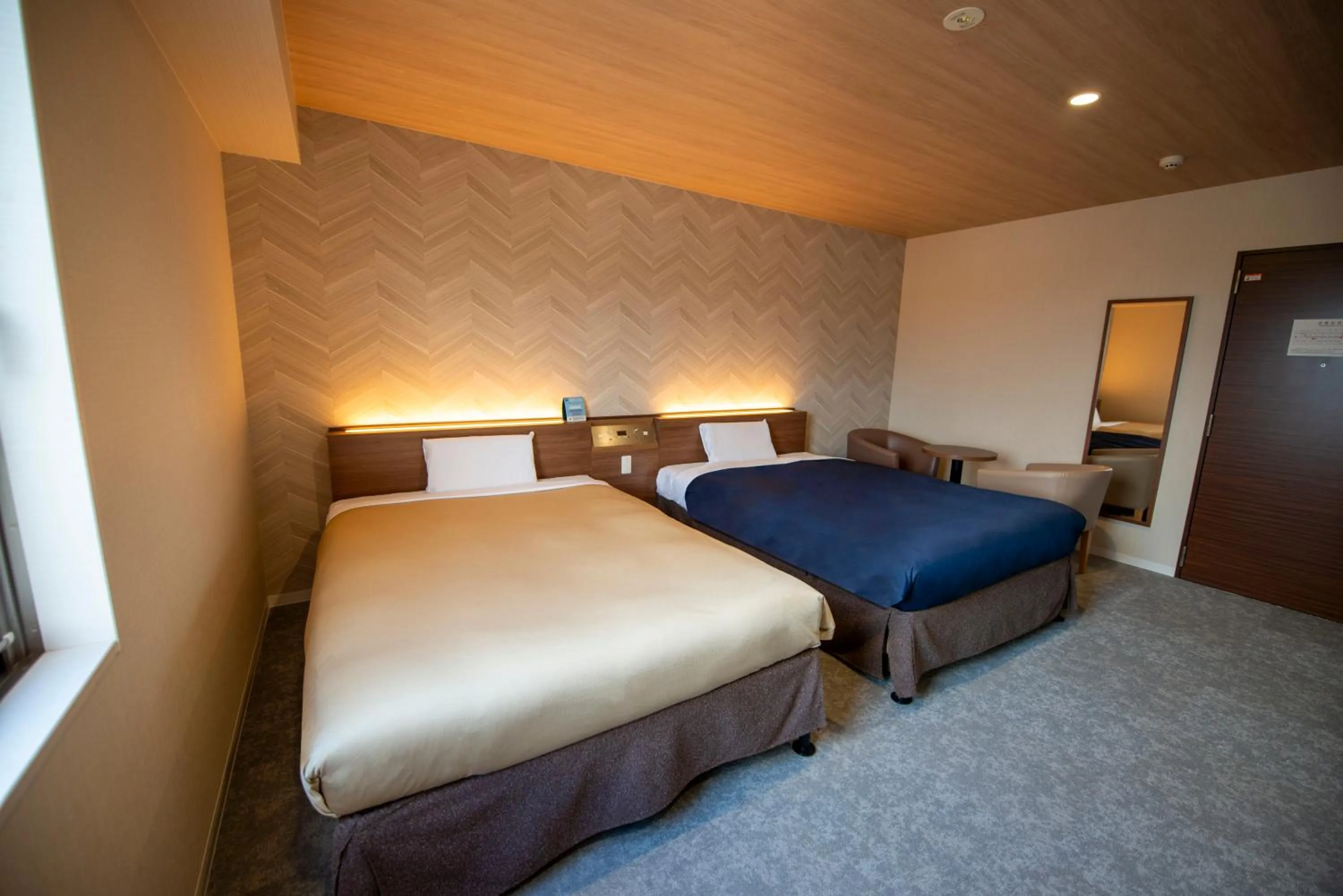 Bed in Hotel New Gaea Nishi Kumamoto Ekimae
