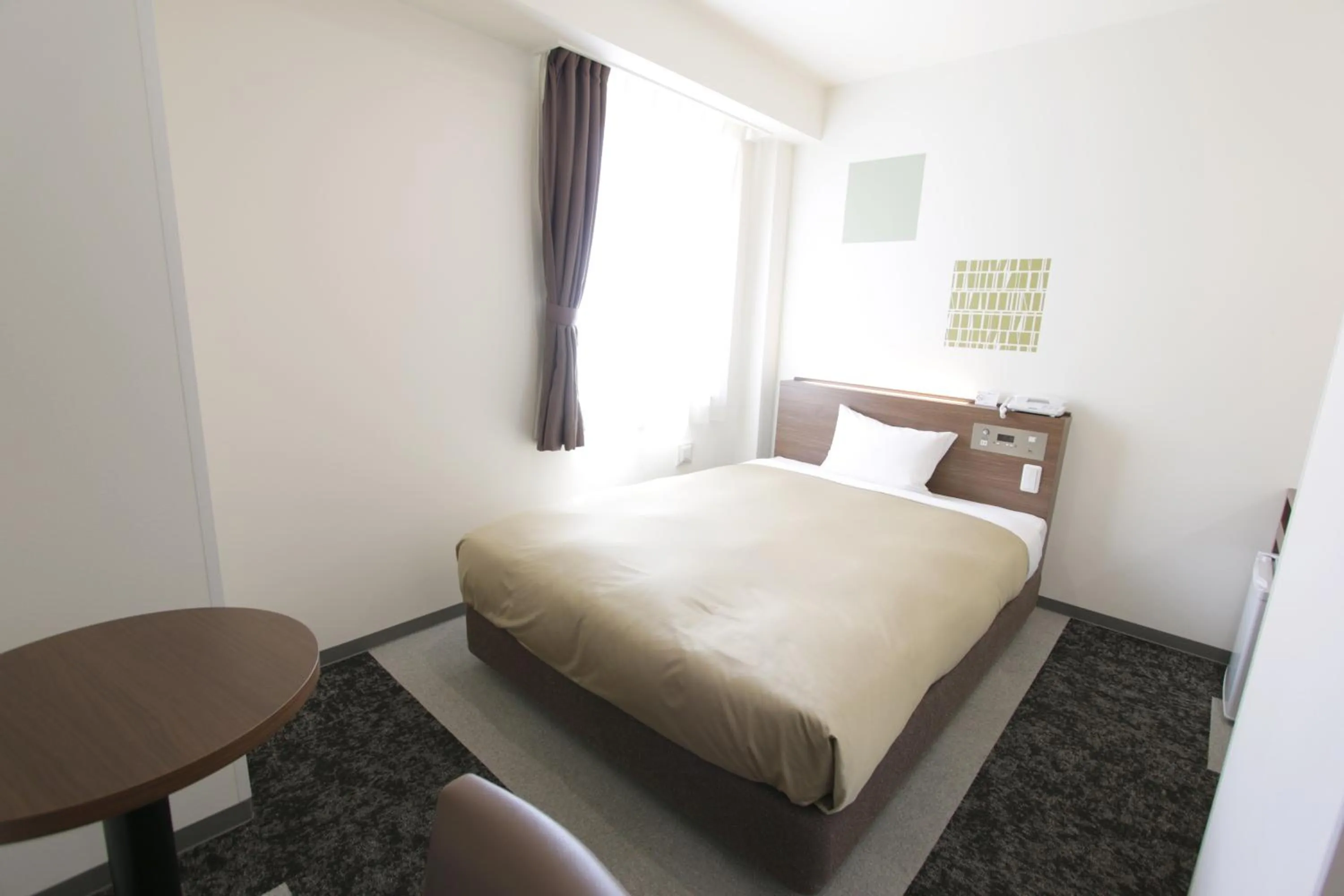 Bed in Hotel New Gaea Nishi Kumamoto Ekimae