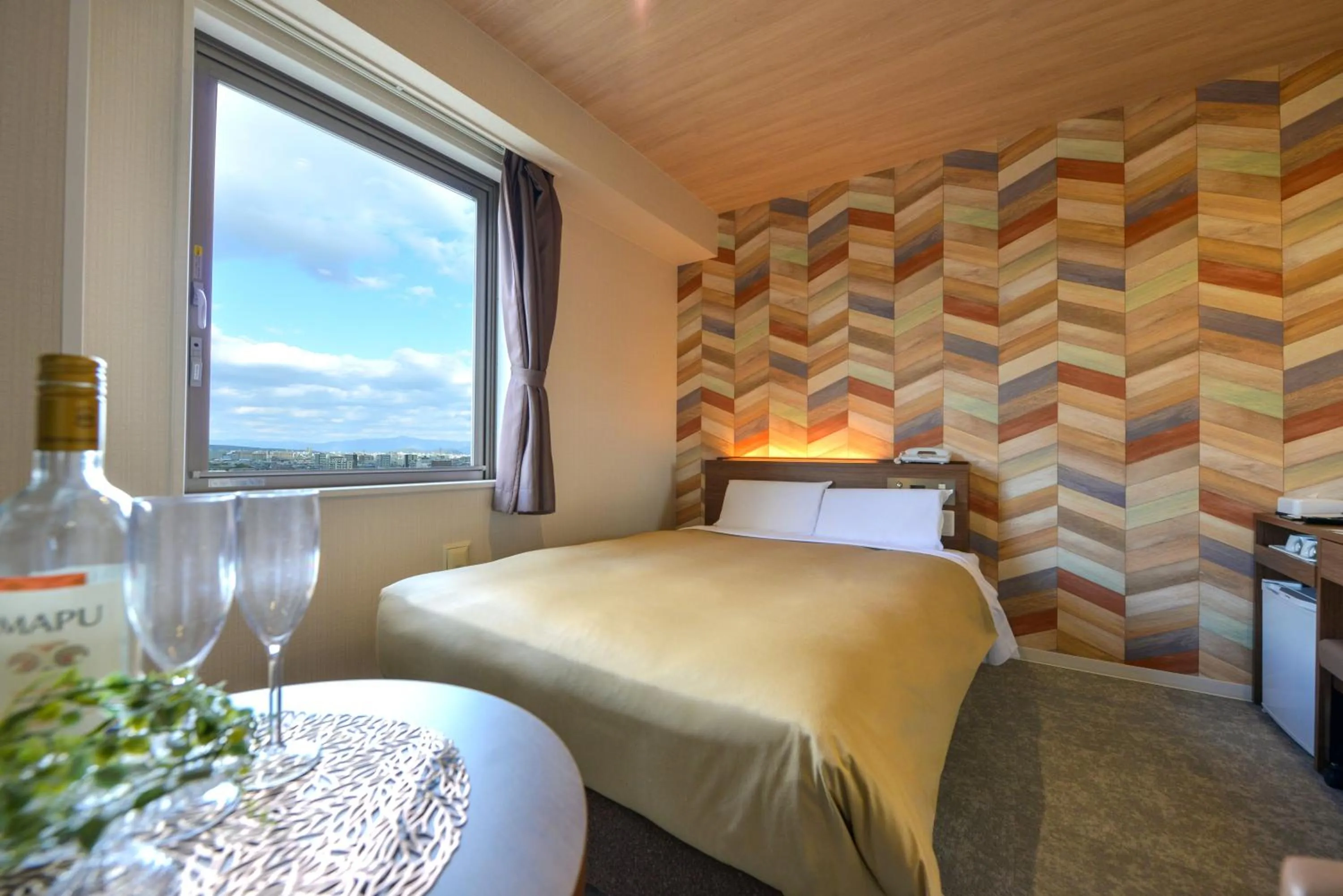 Bed in Hotel New Gaea Nishi Kumamoto Ekimae