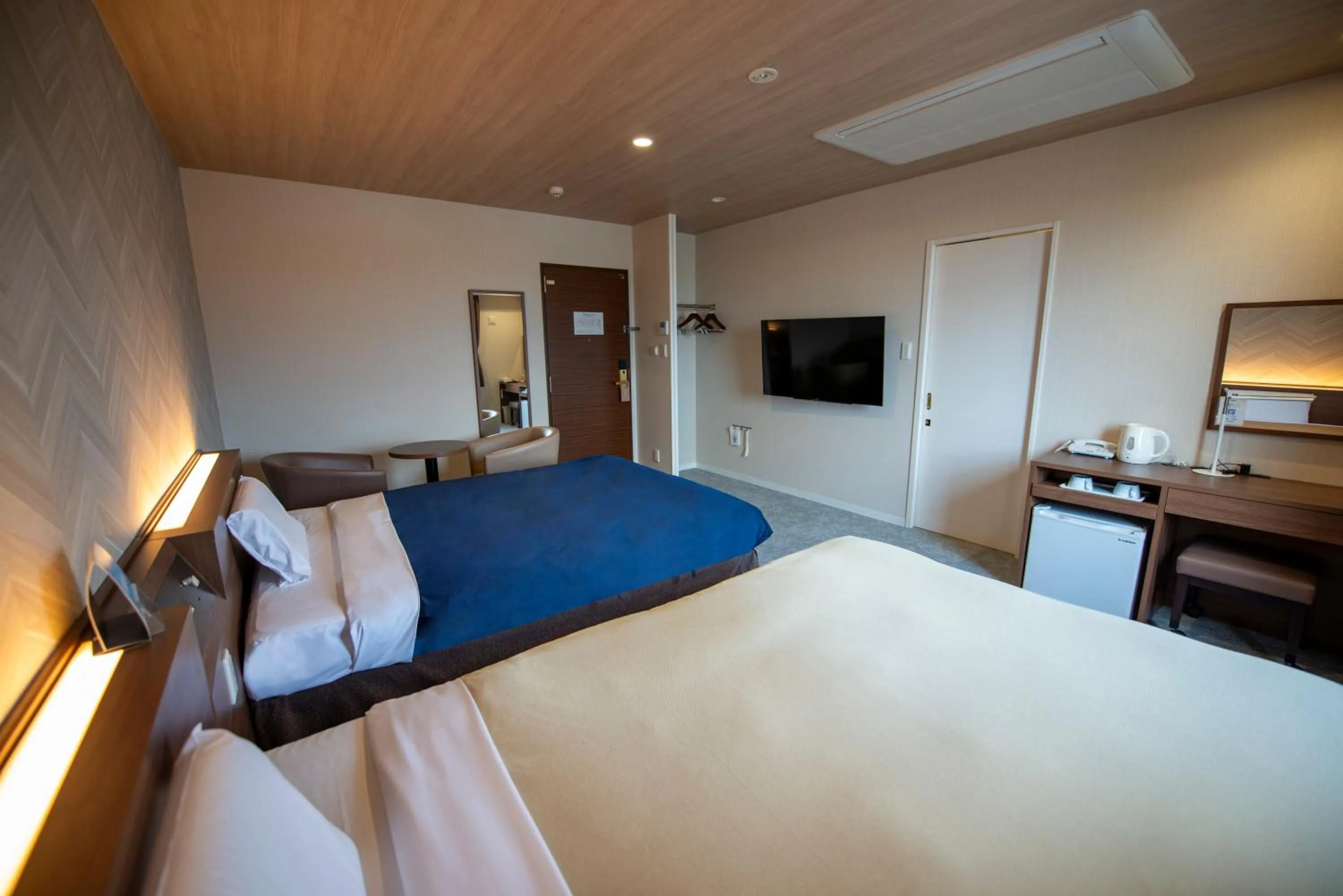 Bed in Hotel New Gaea Nishi Kumamoto Ekimae