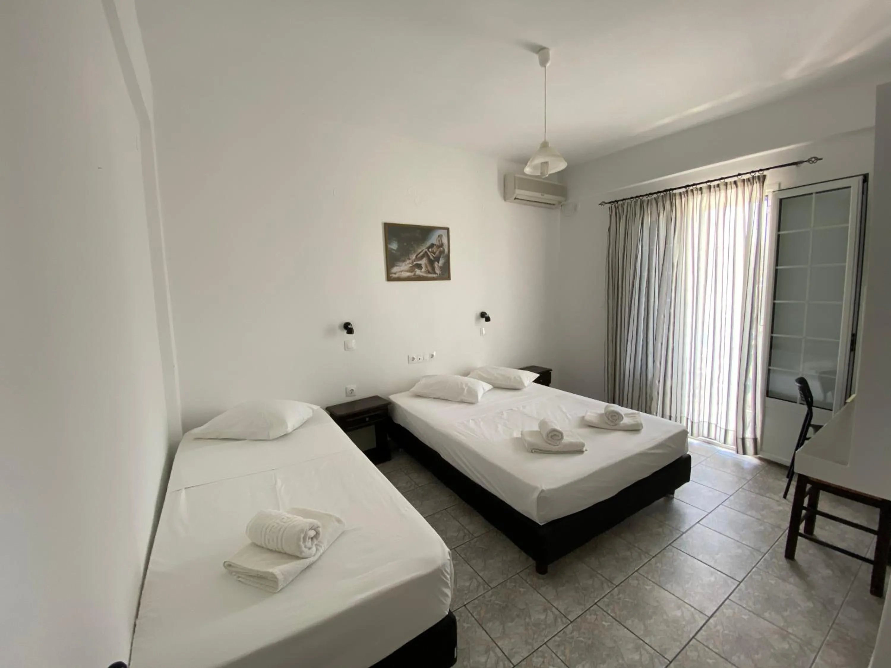 Bed in Deep Blue Rooms & Apartments