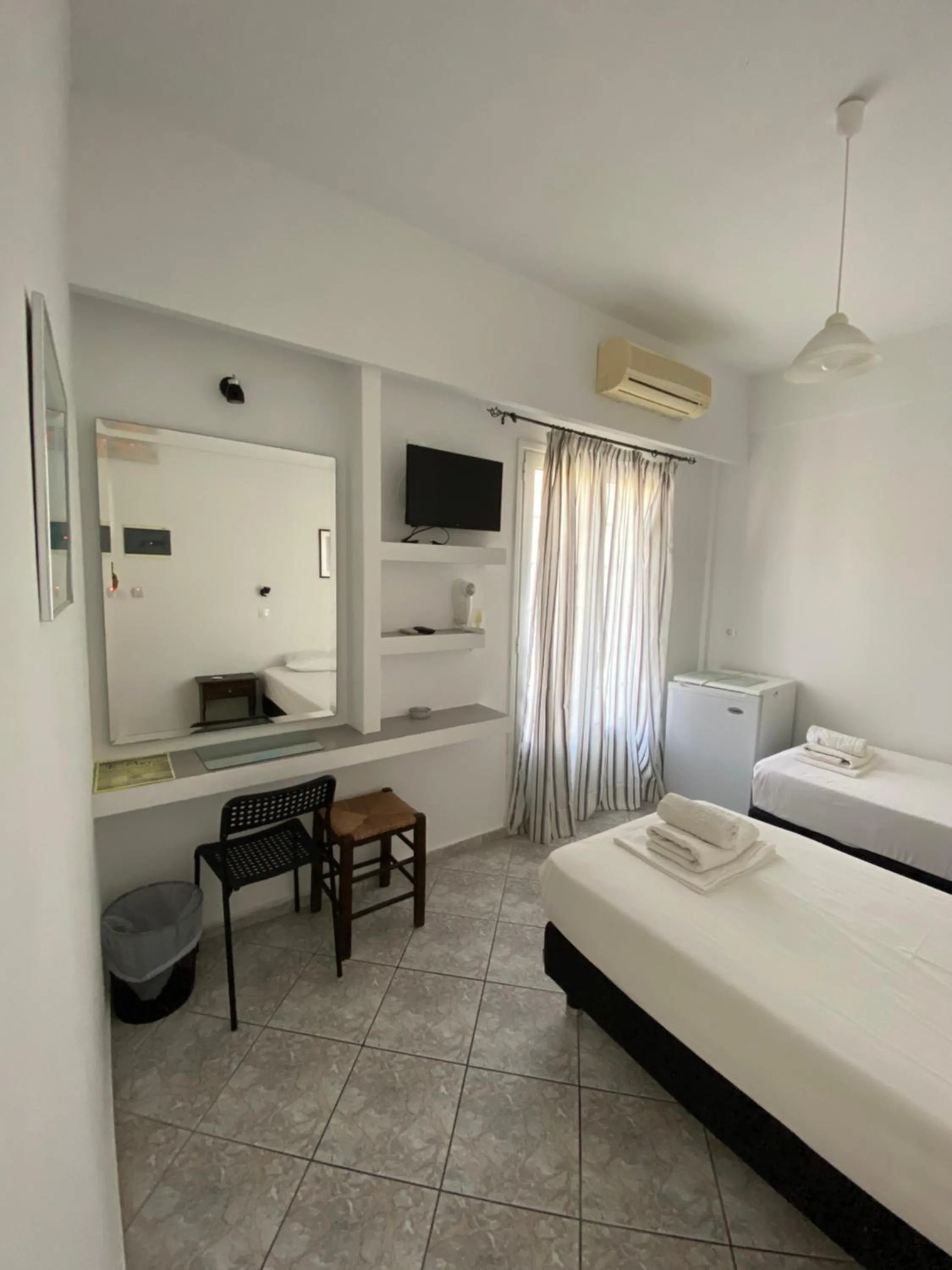 Bed in Deep Blue Rooms & Apartments