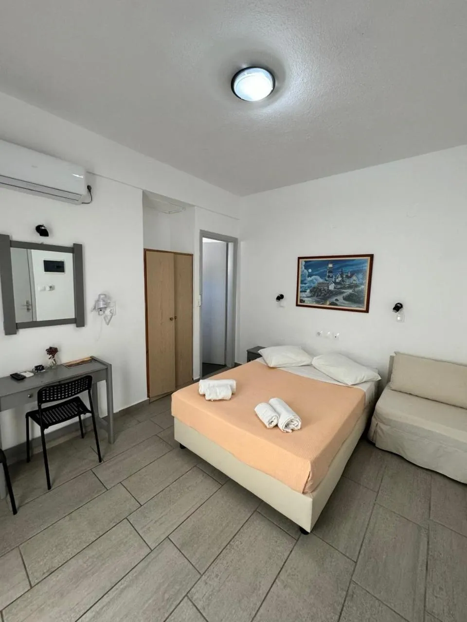 Bed in Deep Blue Rooms & Apartments