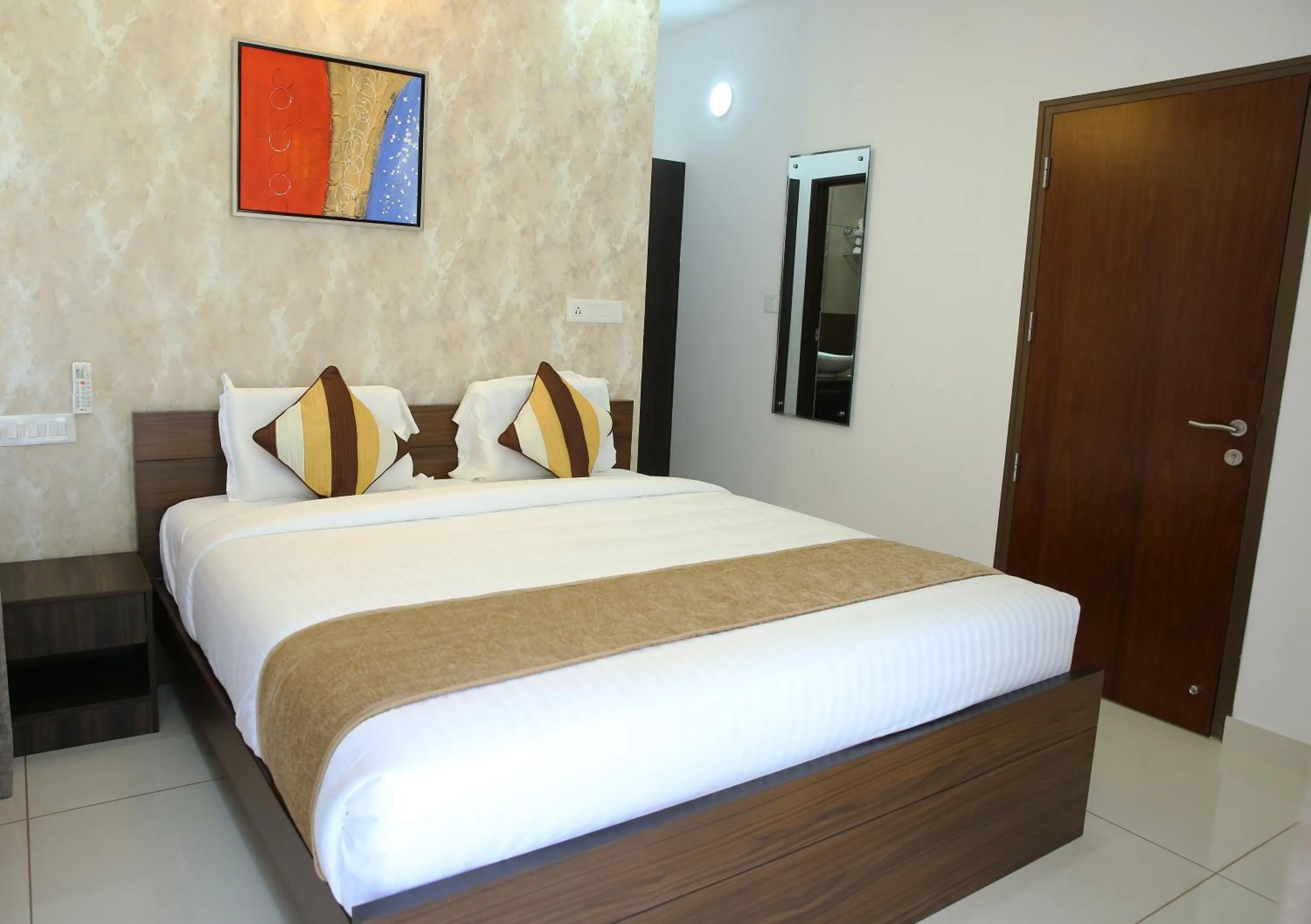 Bed in Eden Isle Luxury Service Apartment