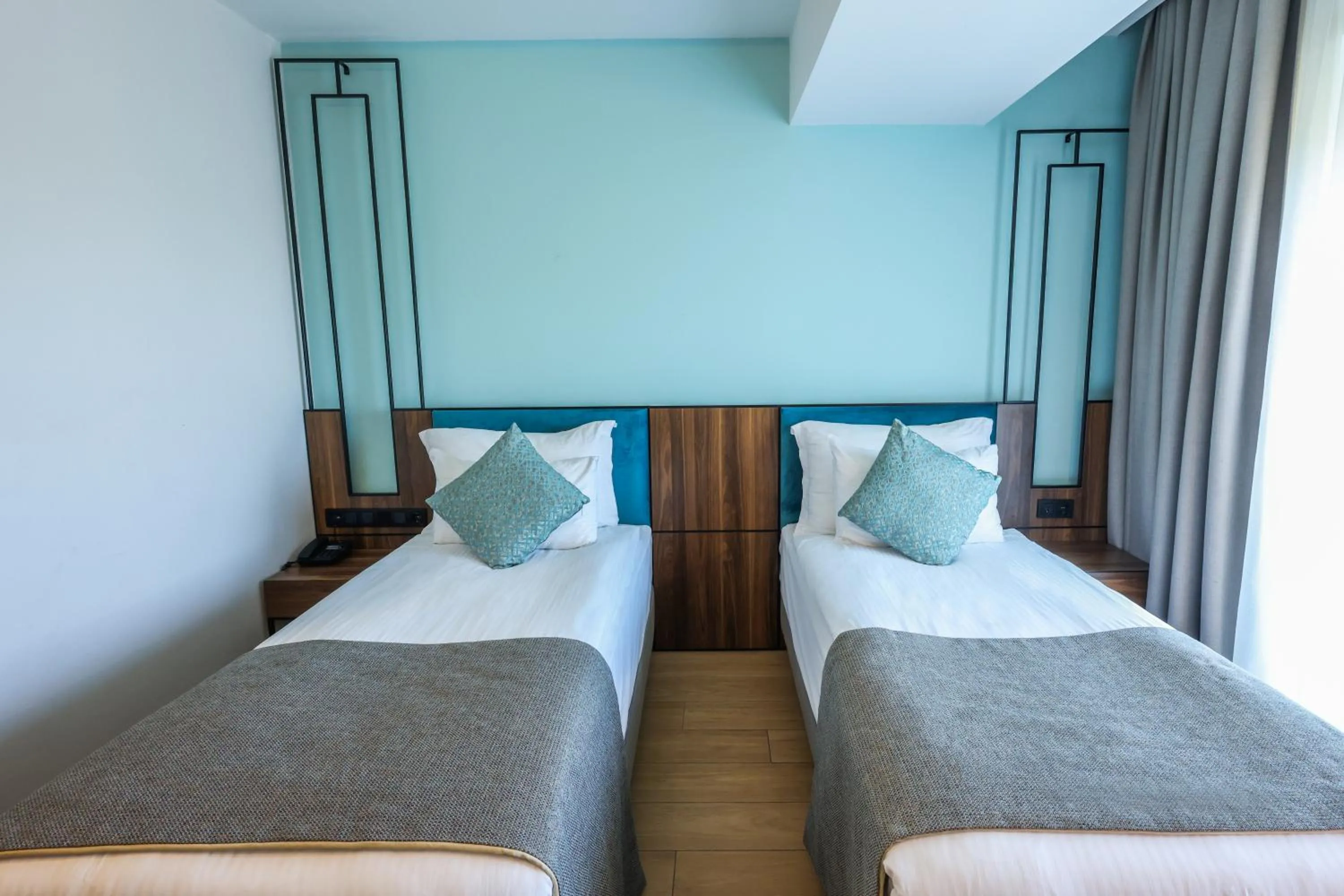 Bed in Leaf Port Hotel