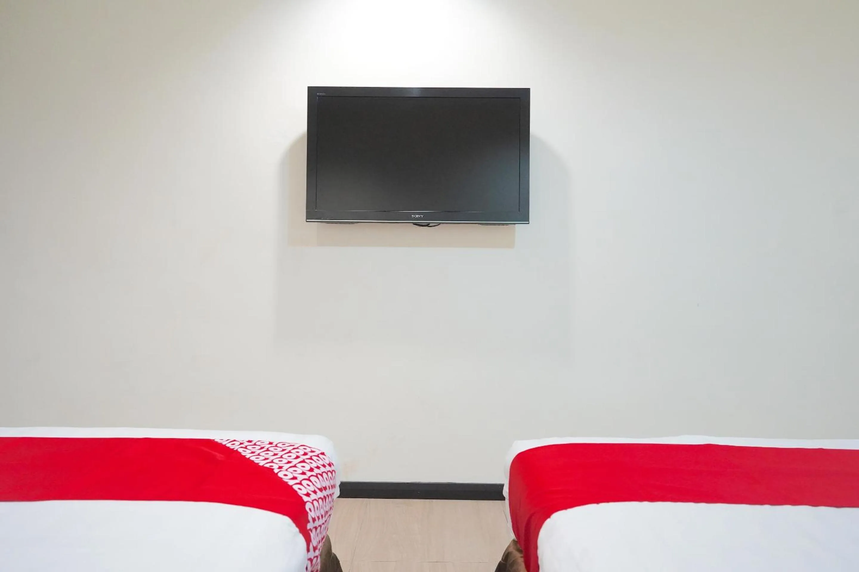 Bedroom in Hotel O Utama Inn