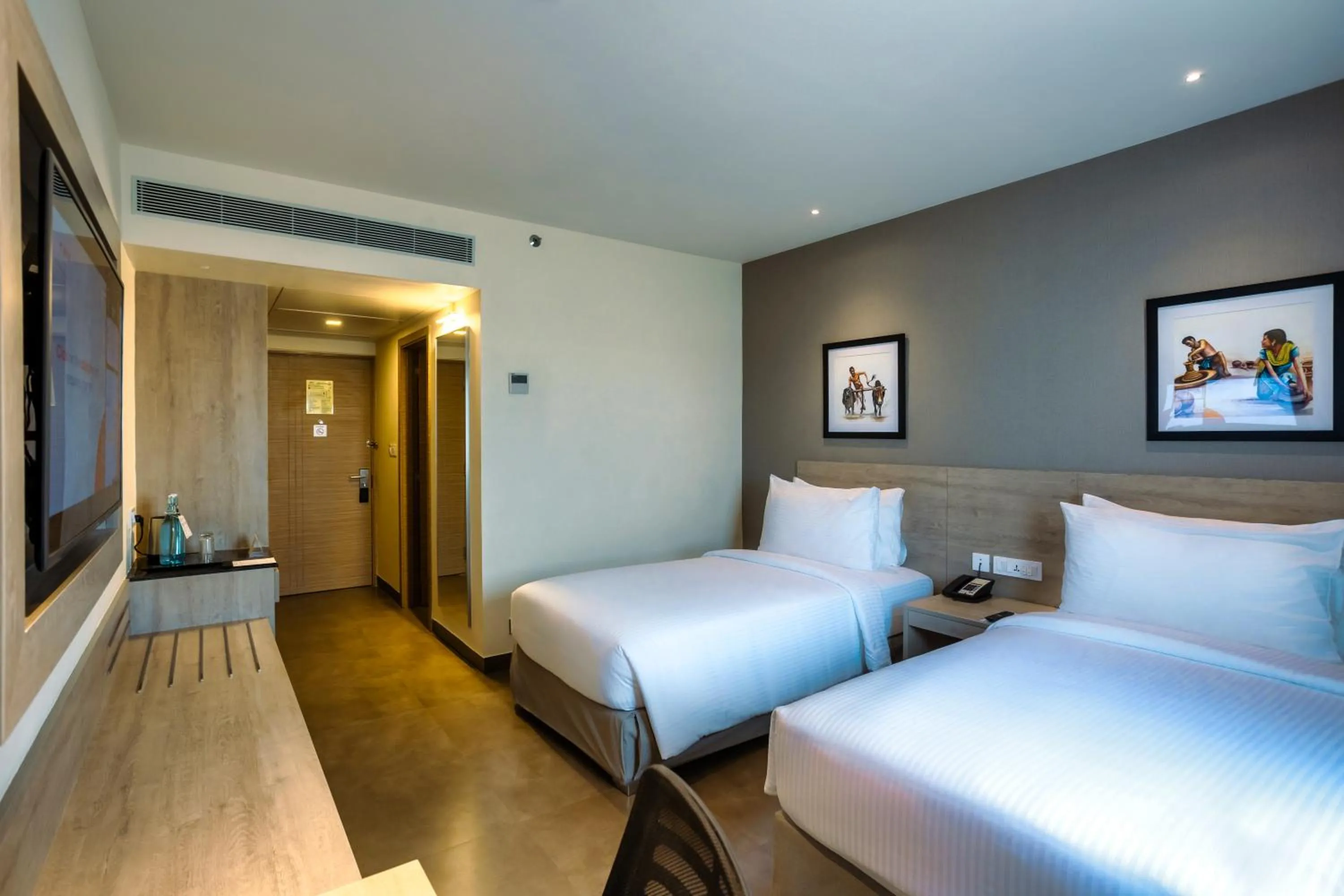 Photo of the whole room, Bed in Amika Hotel,Madurai - Near Airport