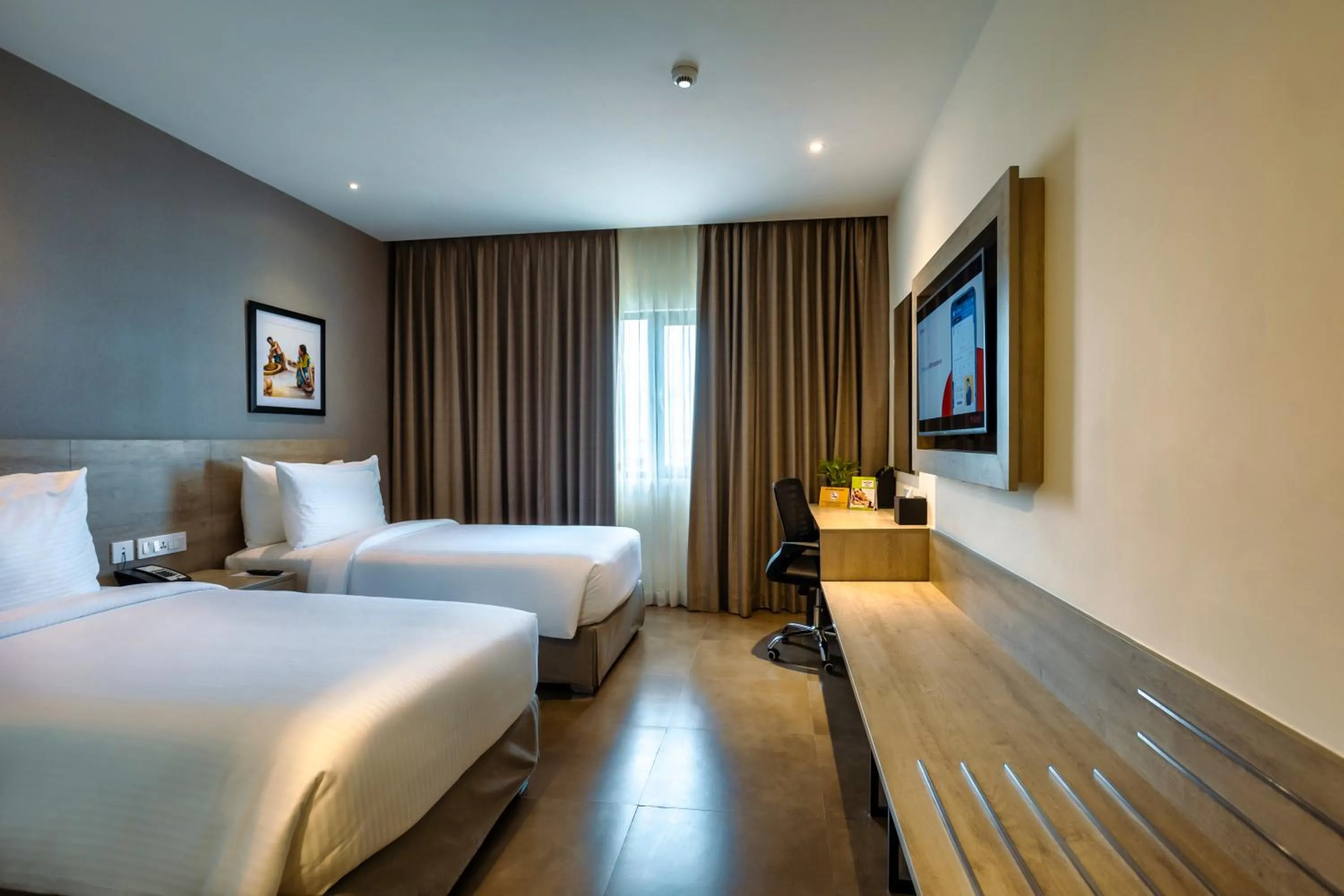 Photo of the whole room, Bed in Amika Hotel,Madurai - Near Airport