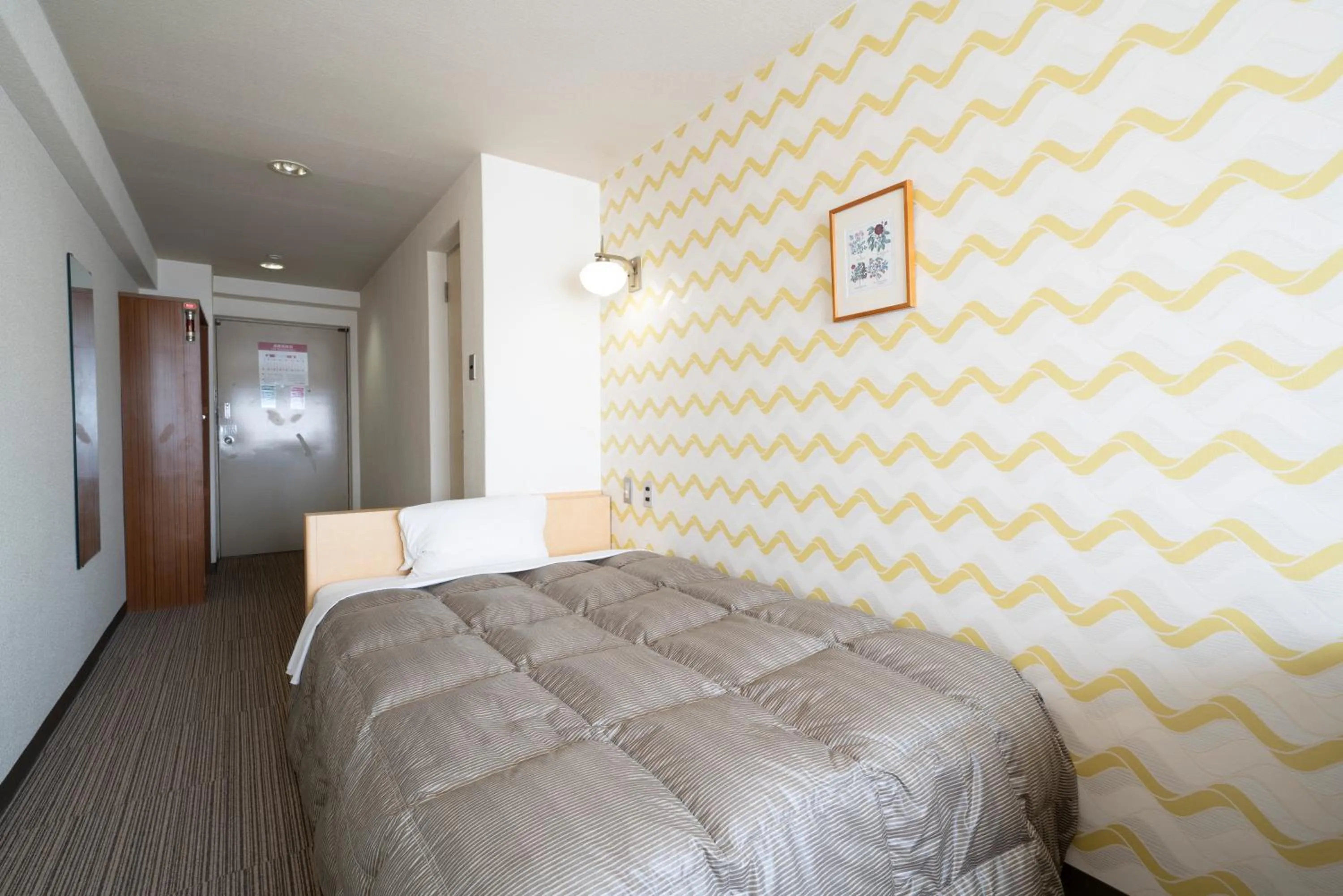 Photo of the whole room, Bed in Hotel Econo Higashi Kanazawa