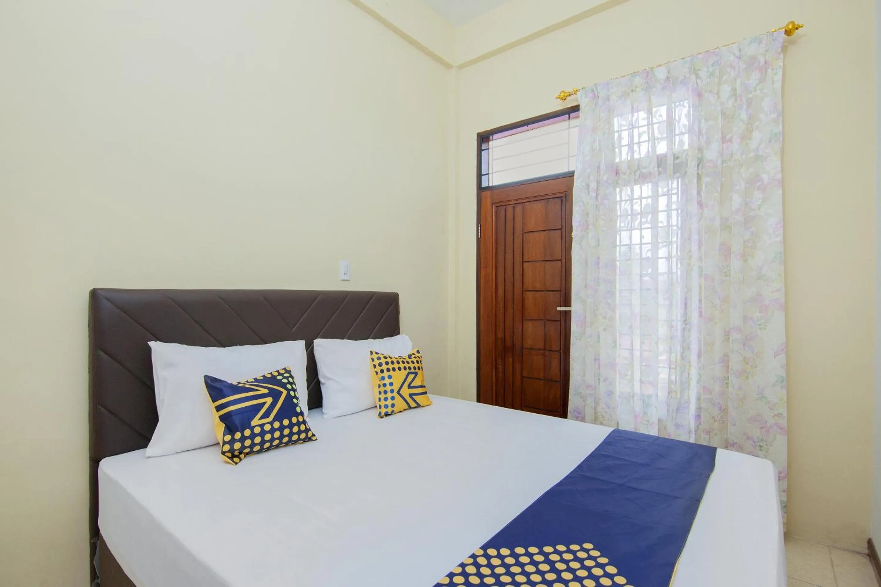 Bedroom, Bed in SPOT ON 2076 Hotel Stadion