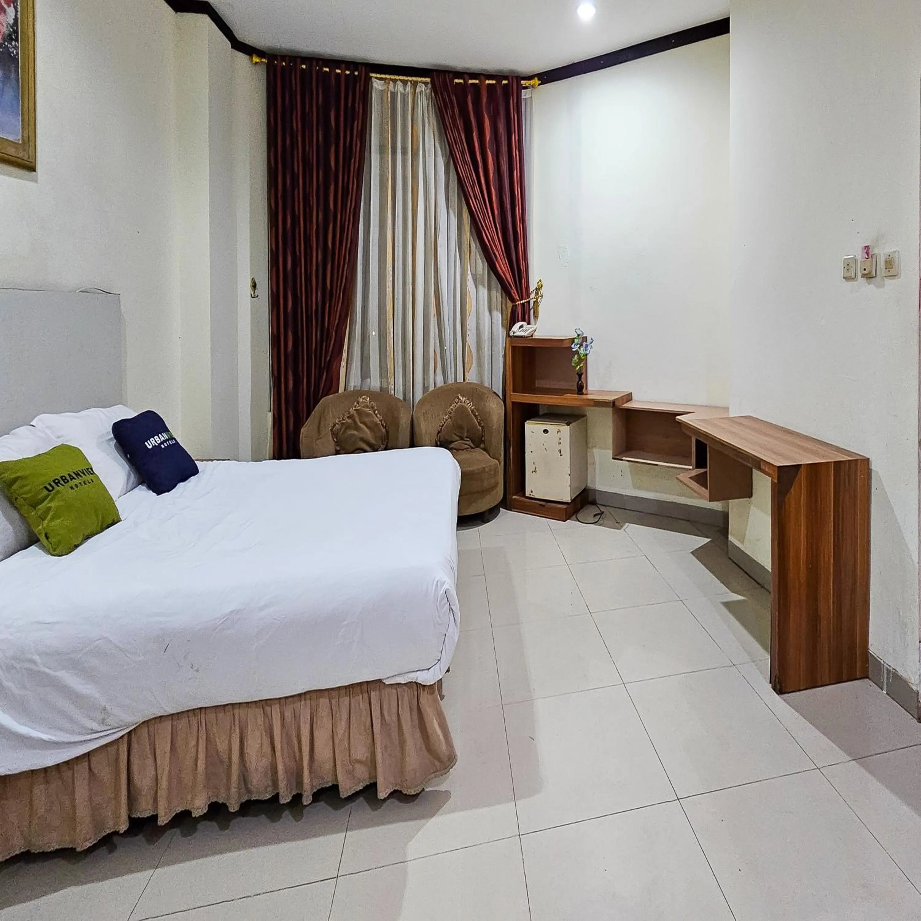 Bedroom, Bed in Urbanview Hotel Kharisma Banjarmasin