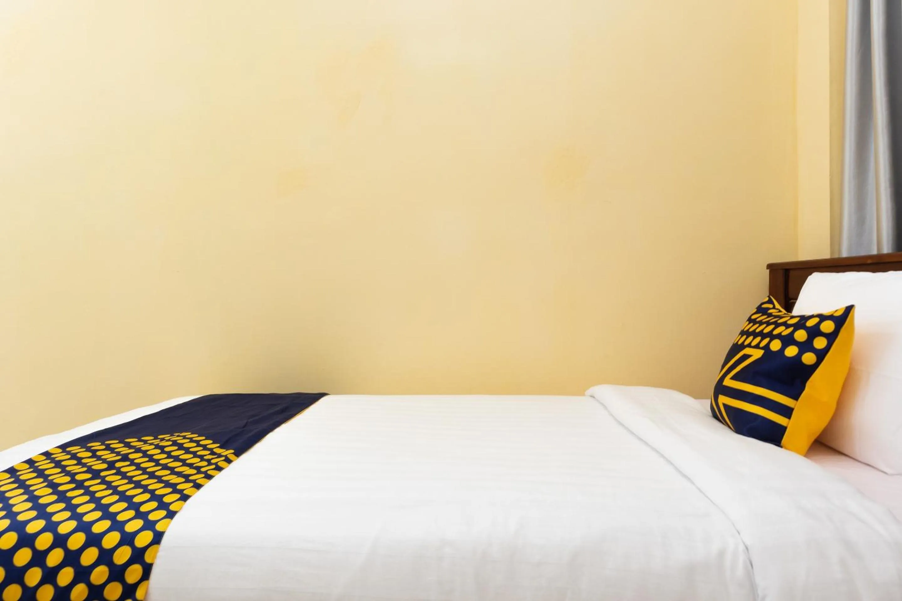 Bedroom in SPOT ON 2063 Bethania Residence