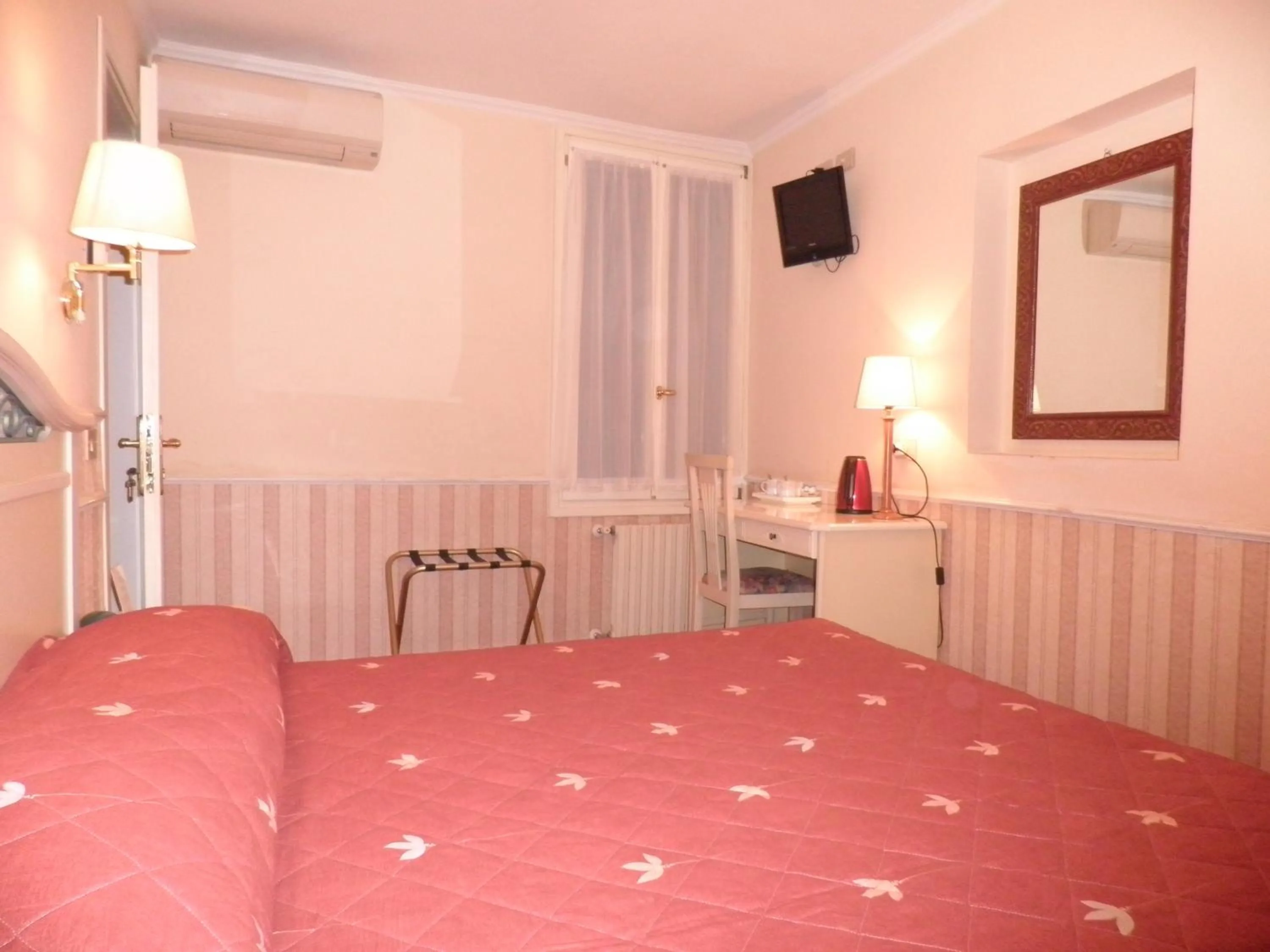 Bed in AL CAMPANIEL BED AND BREAKFAST