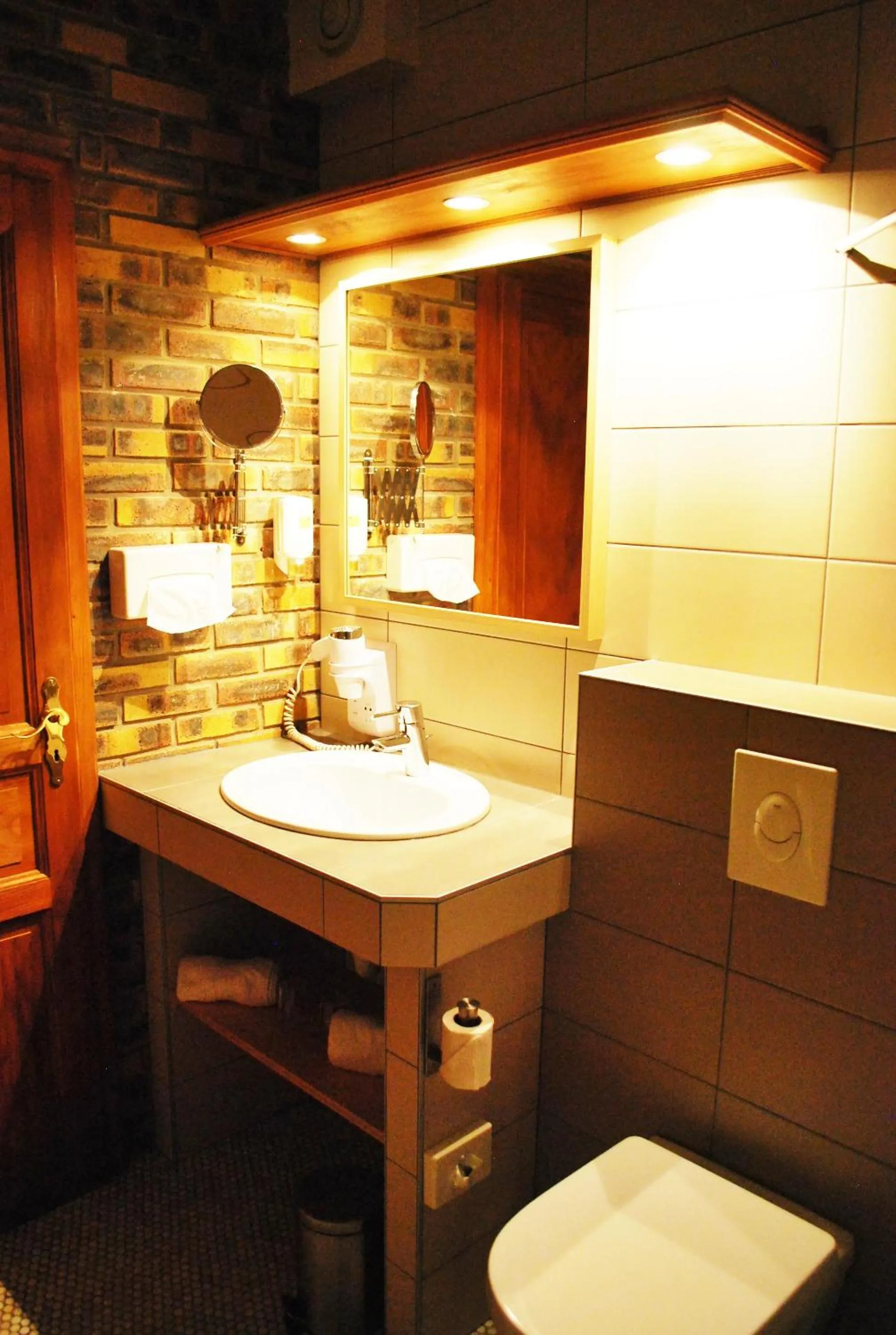 Bathroom in Logis Hôtel Restaurant Kleiber