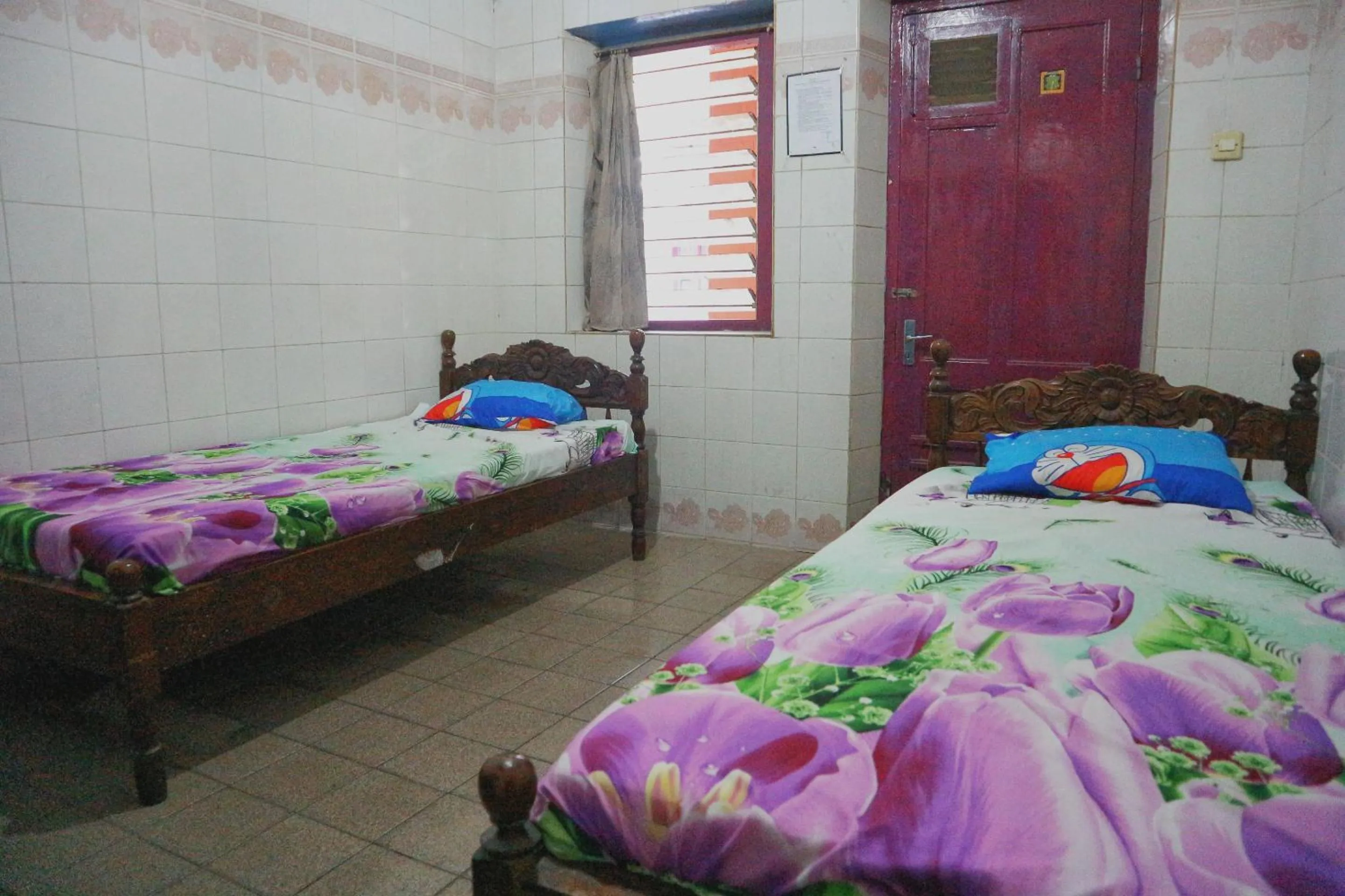 Bedroom, Bed in OYO Life 1972 Aman Family Inn Syariah