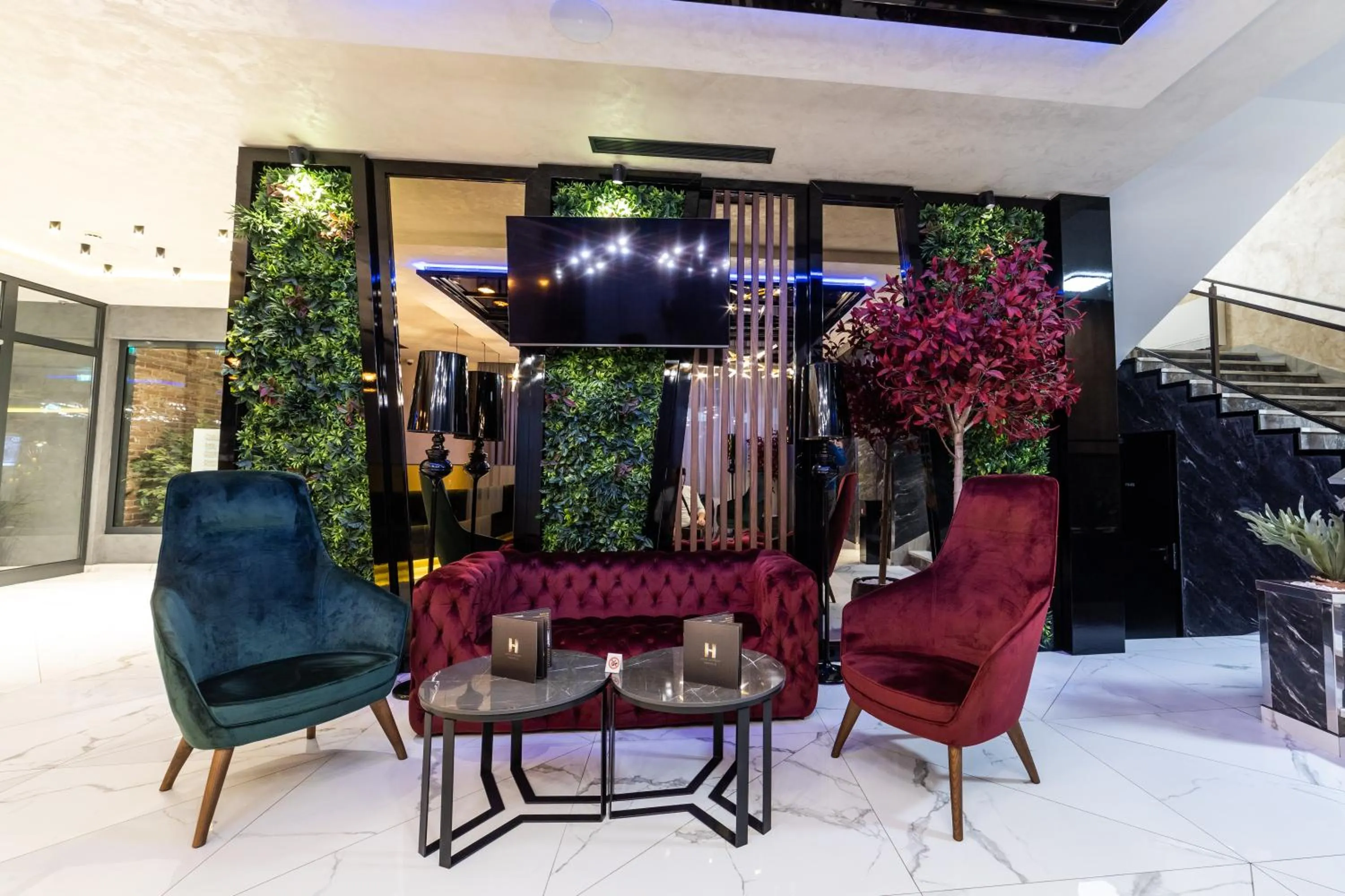 Communal lounge/ TV room in Hammeum Hotel