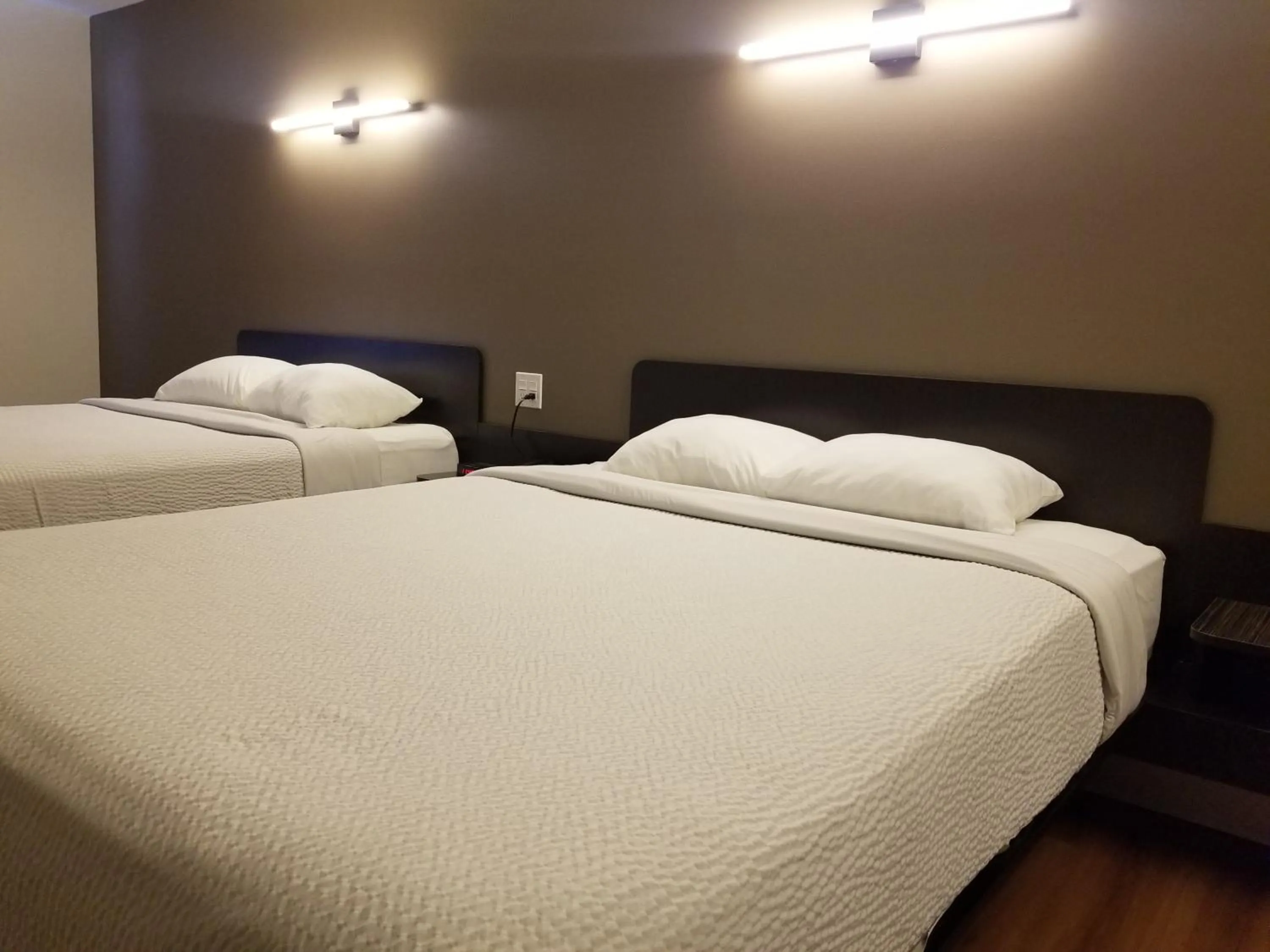 Bed in Joys Inn Innisfail, AB