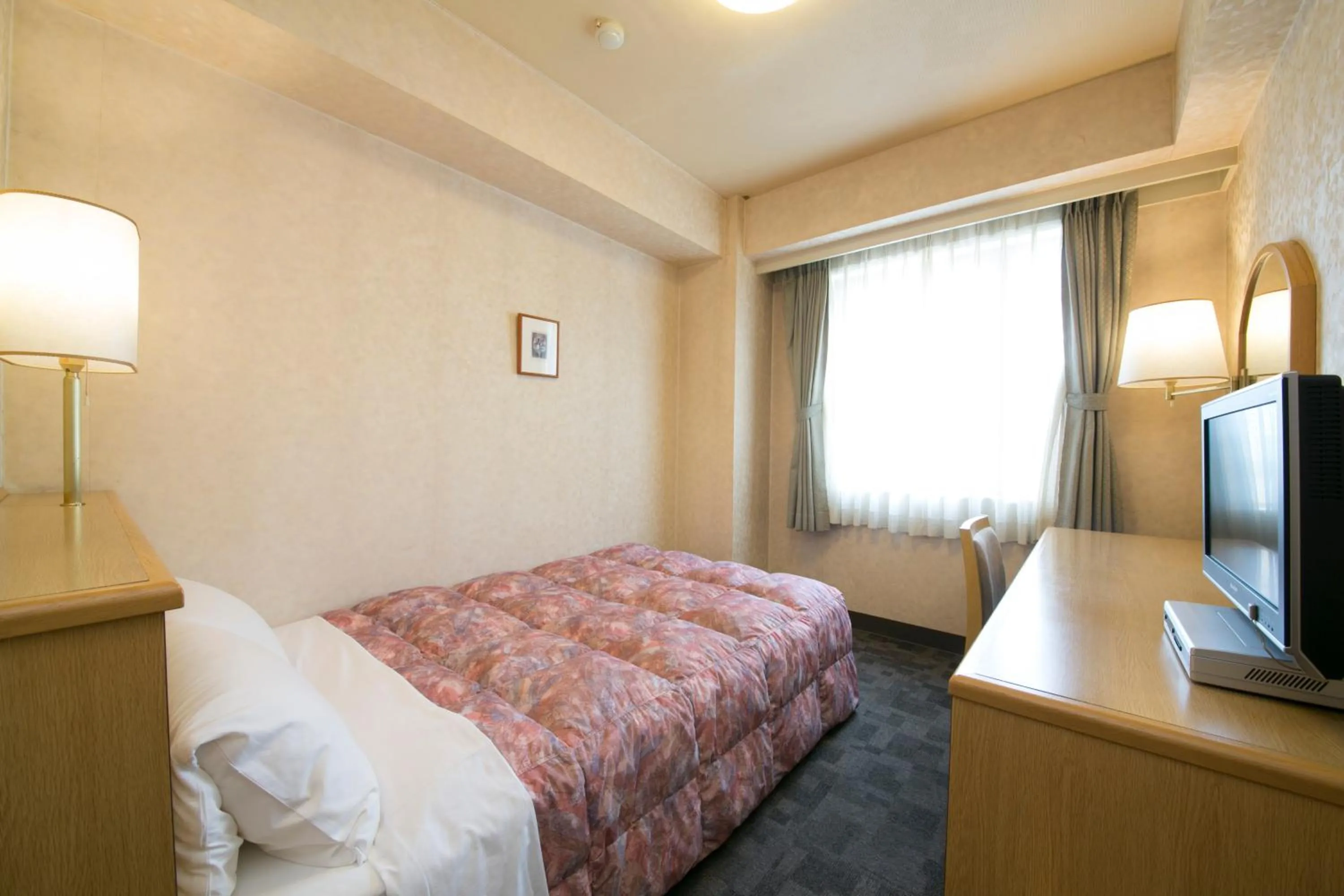 Photo of the whole room, Bed in Kuwana Green Hotel