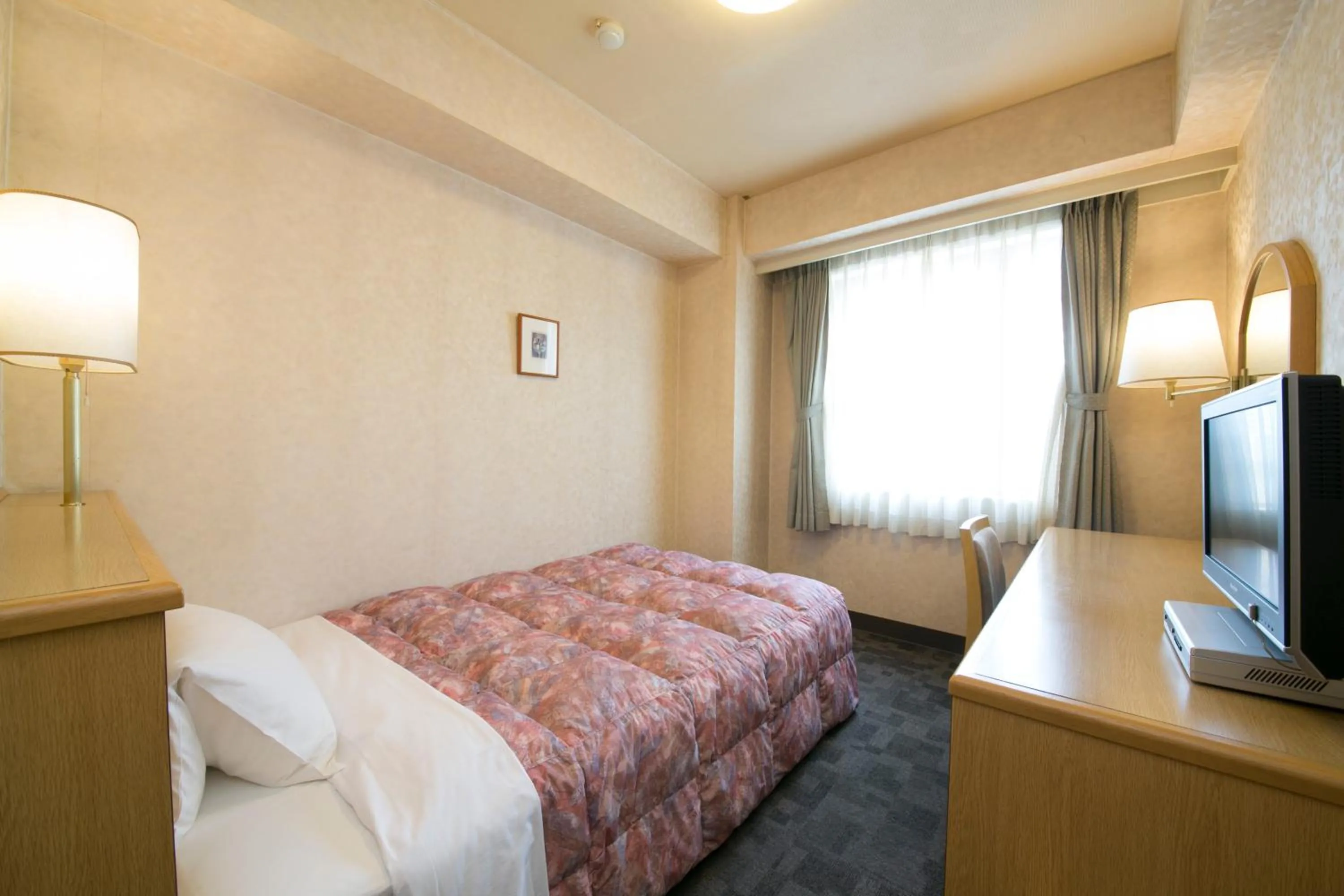 Photo of the whole room, Bed in Kuwana Green Hotel