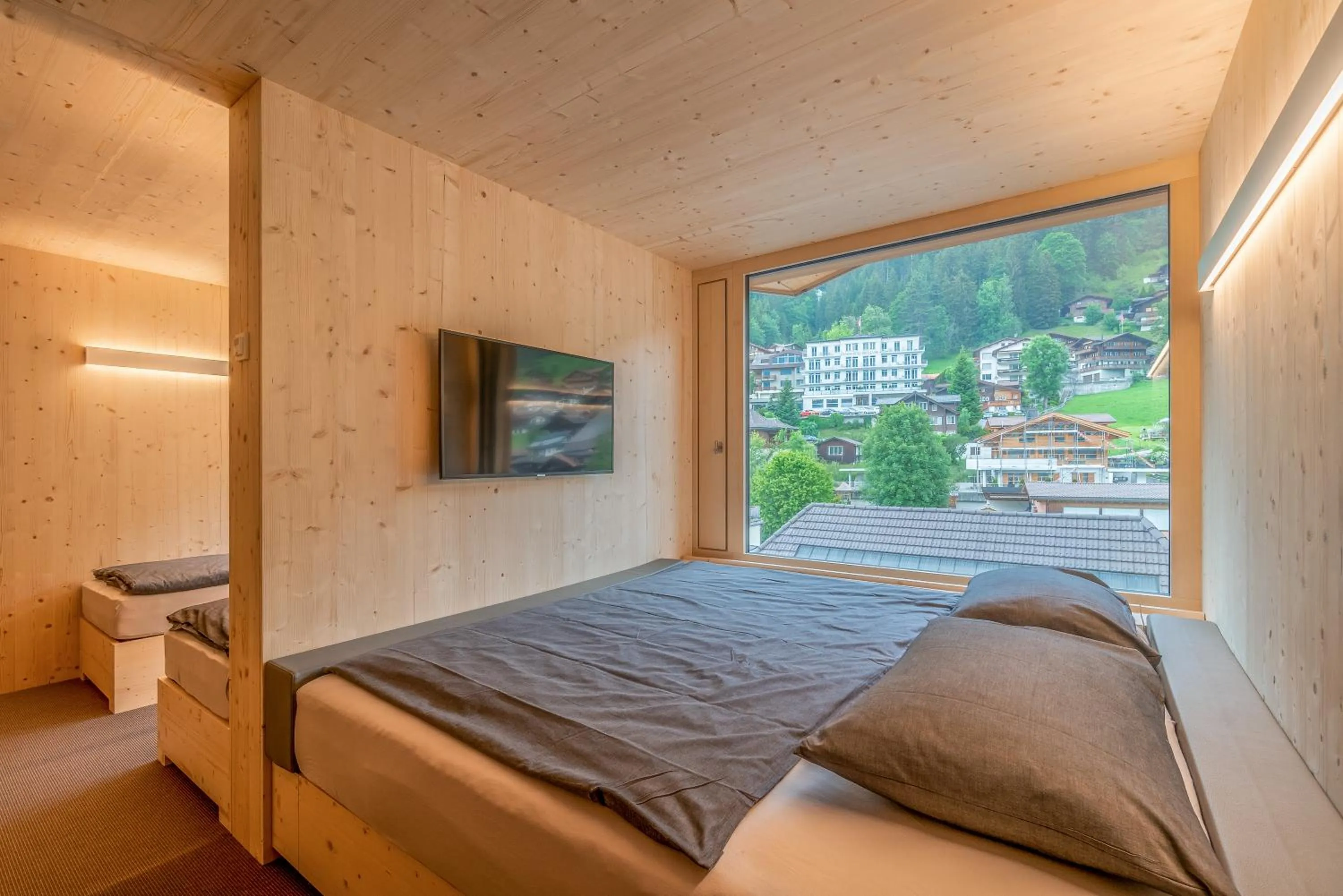 Photo of the whole room, Bed in Revier Mountain Lodge Adelboden