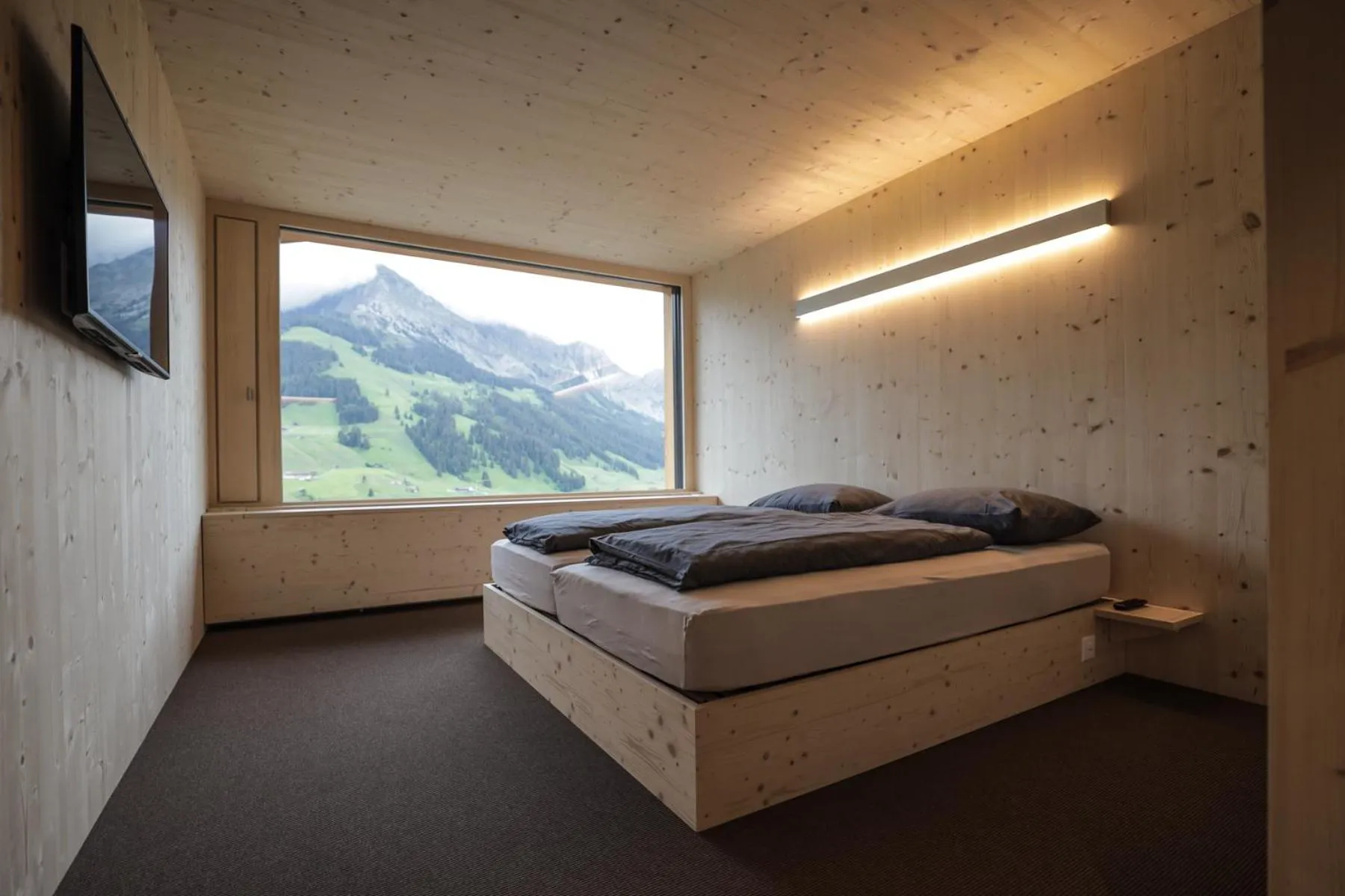 Photo of the whole room, Bed in Revier Mountain Lodge Adelboden