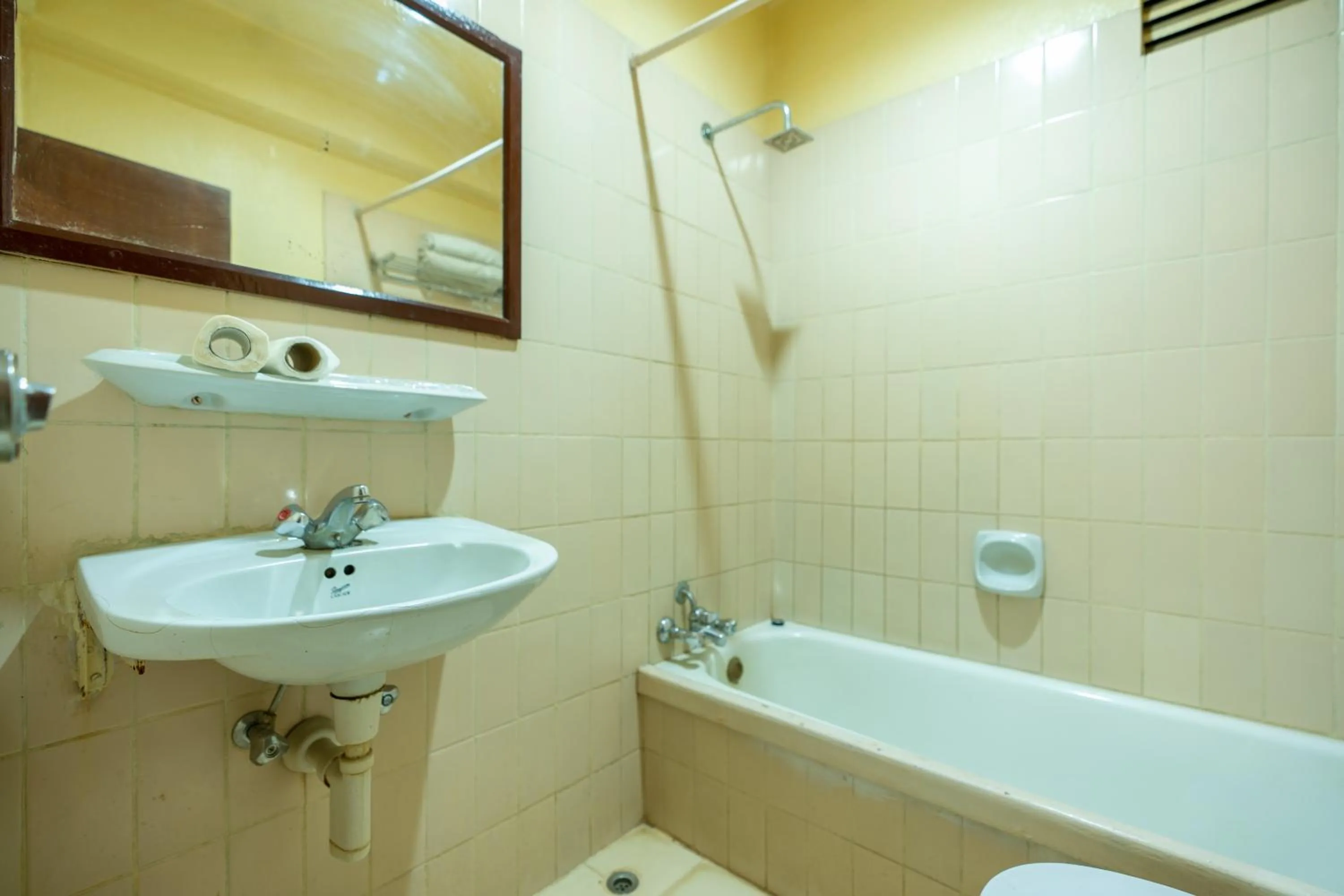 Toilet in Mystic Homes Hotel