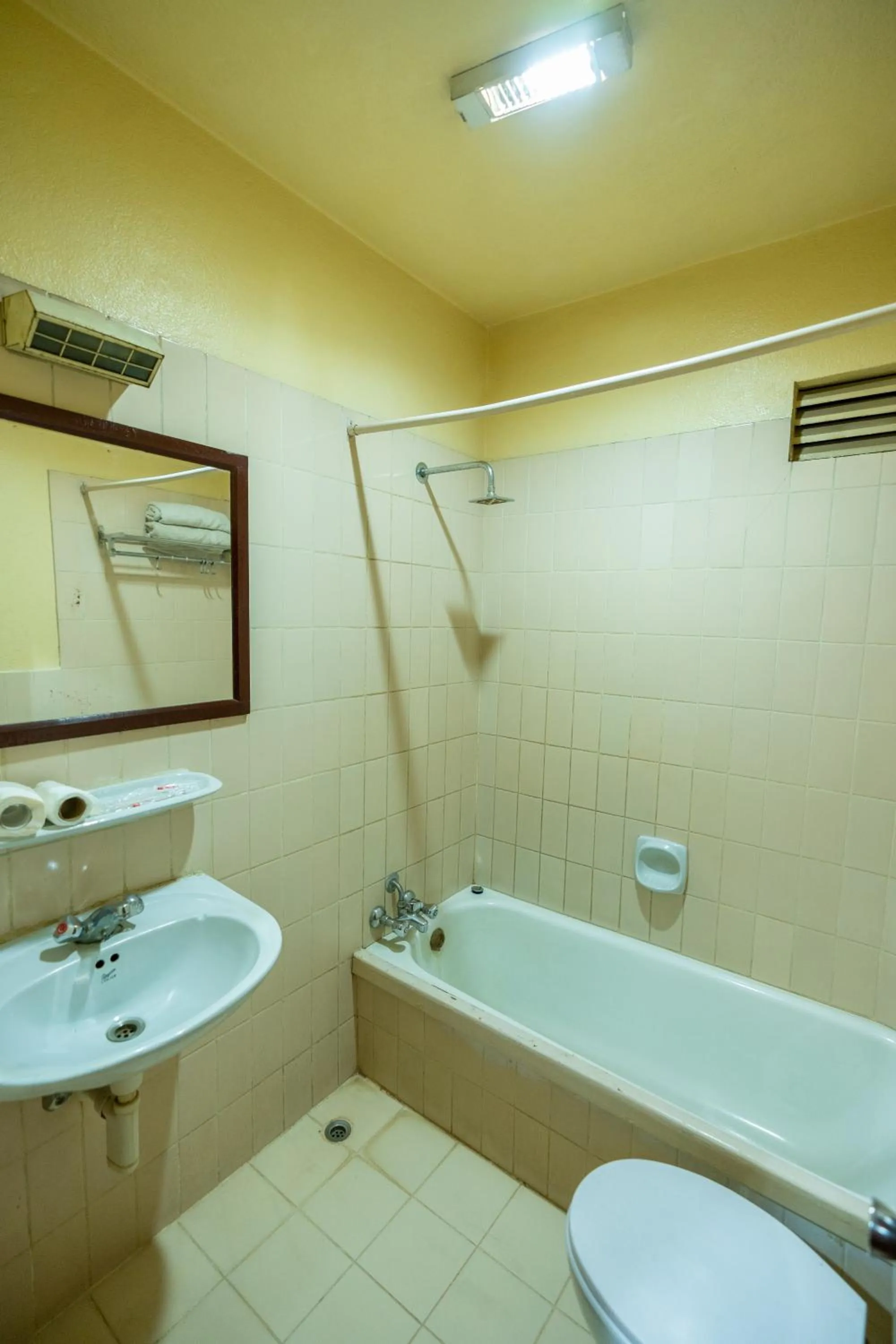 Toilet in Mystic Homes Hotel