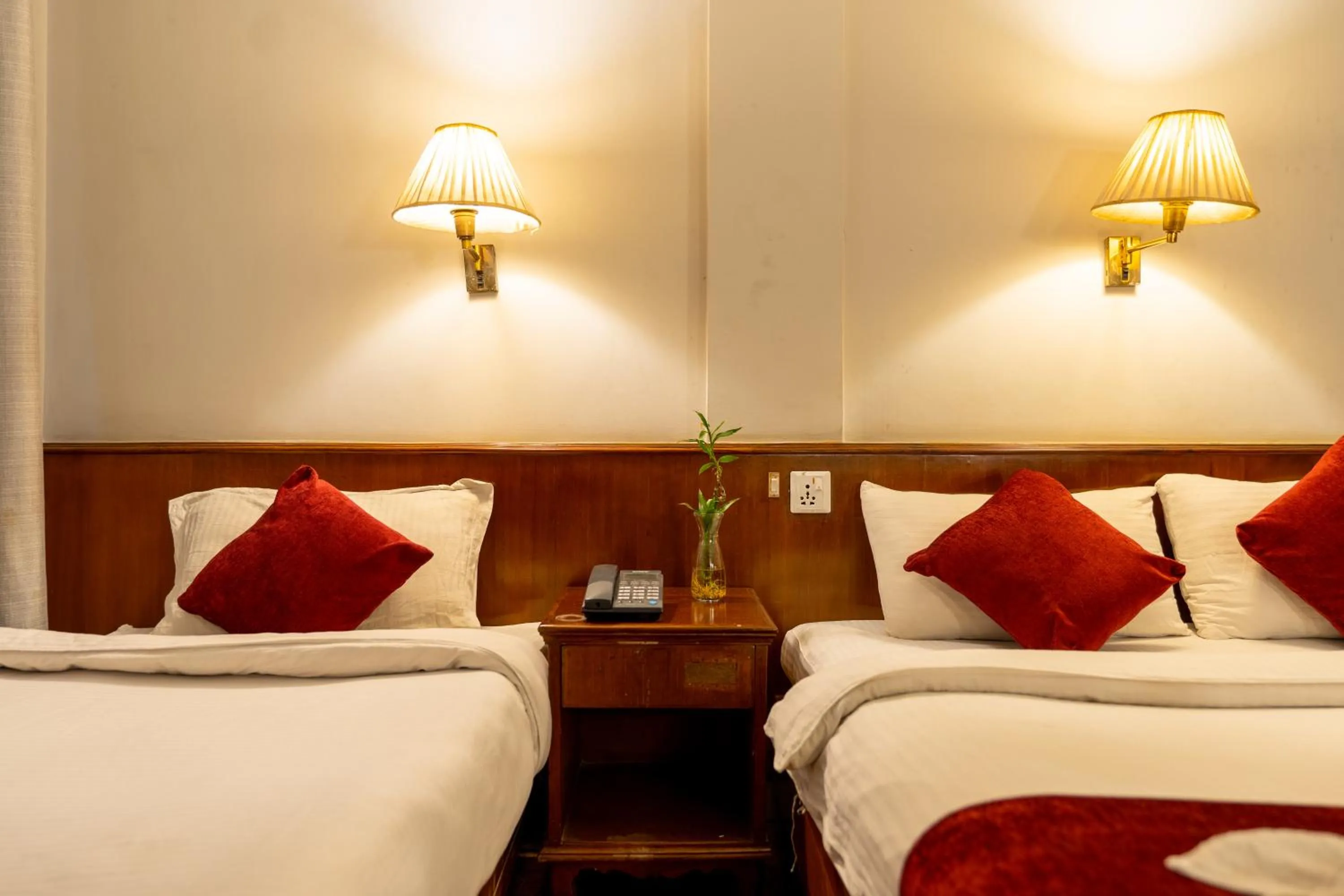 Bed in Mystic Homes Hotel