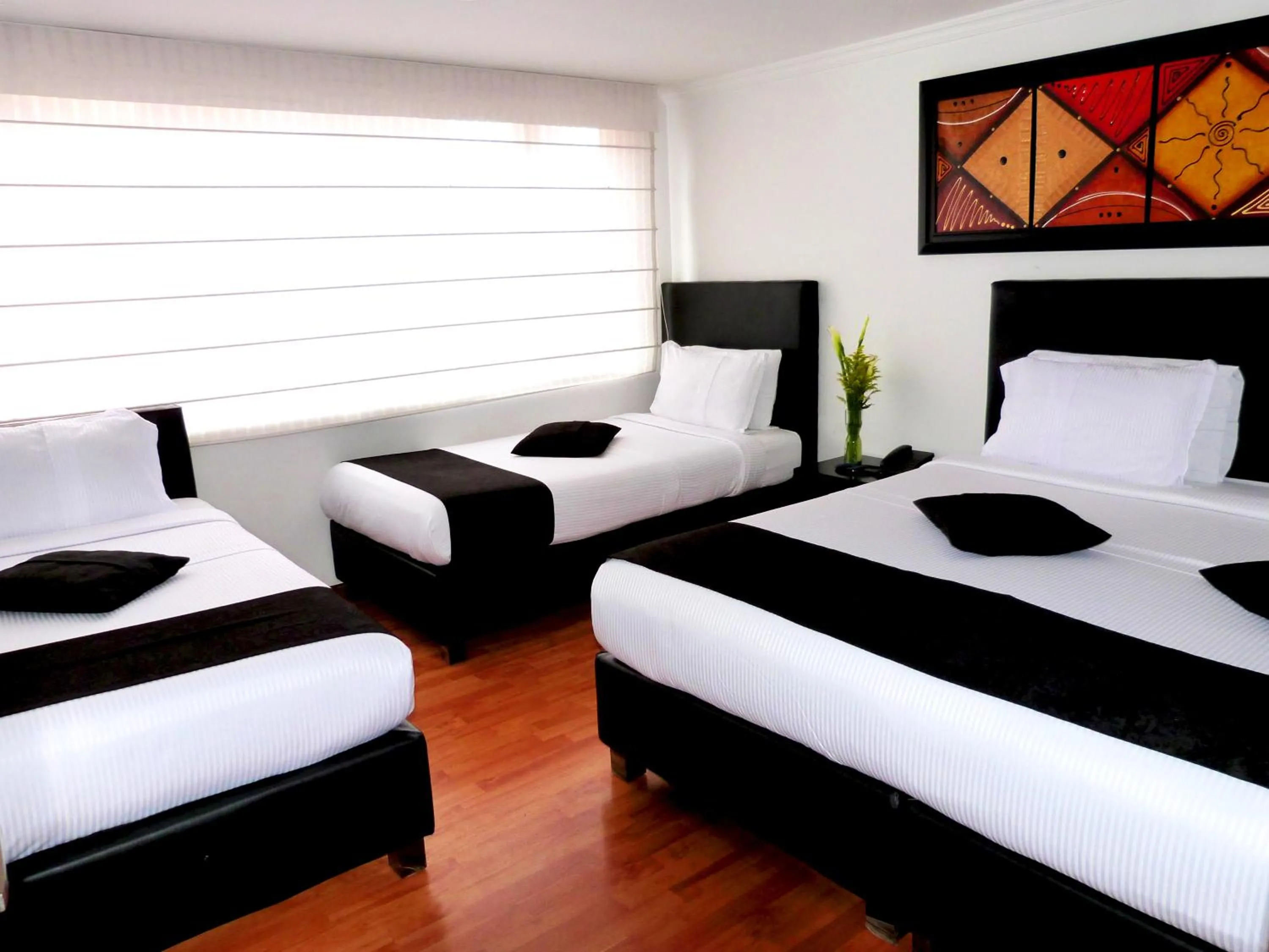 Quadruple Room in Hotel Radel Bogotá