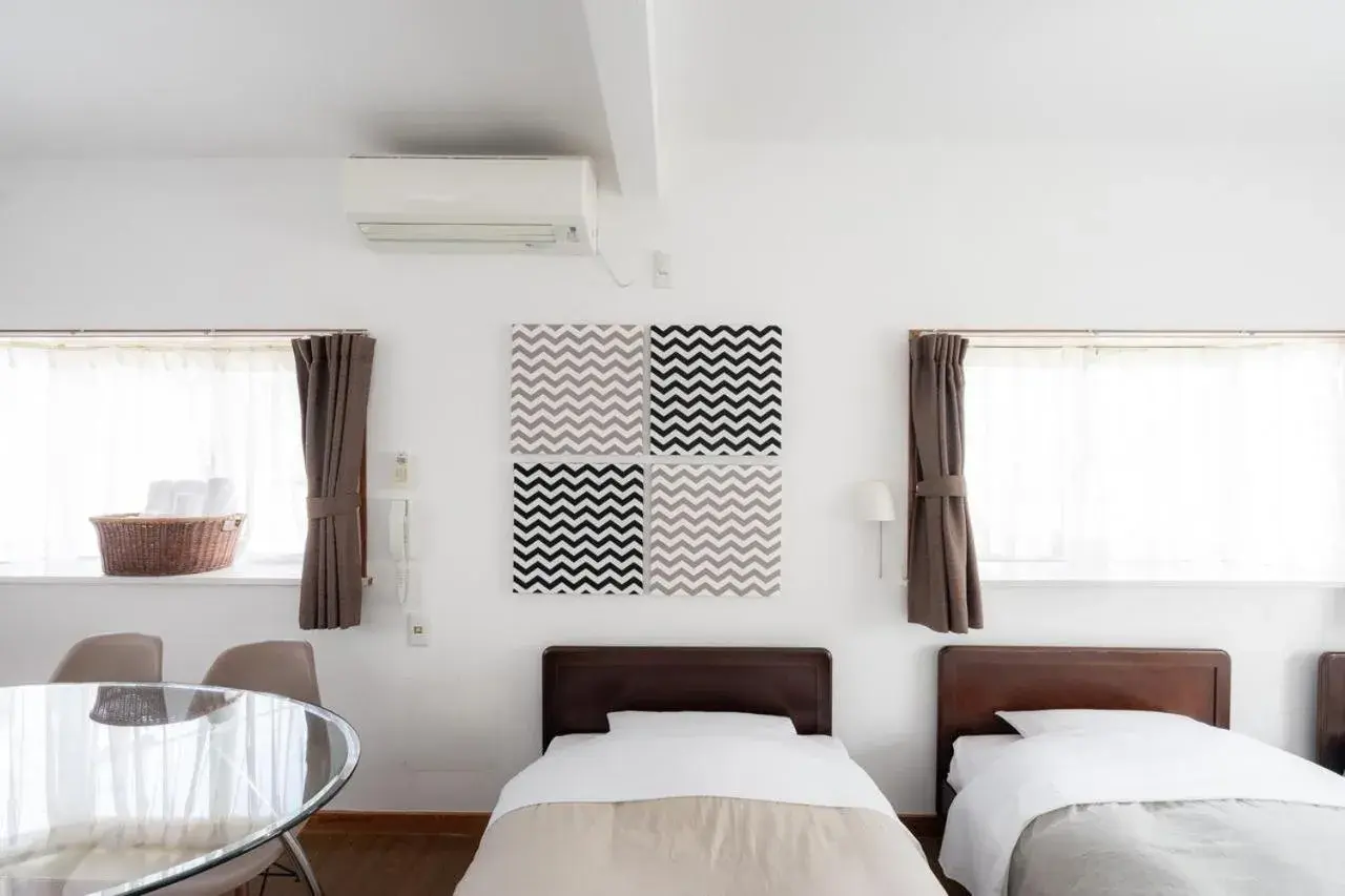 Bed in Beach Side Inn Shirahama Bed in Beach Side Inn Shirahama