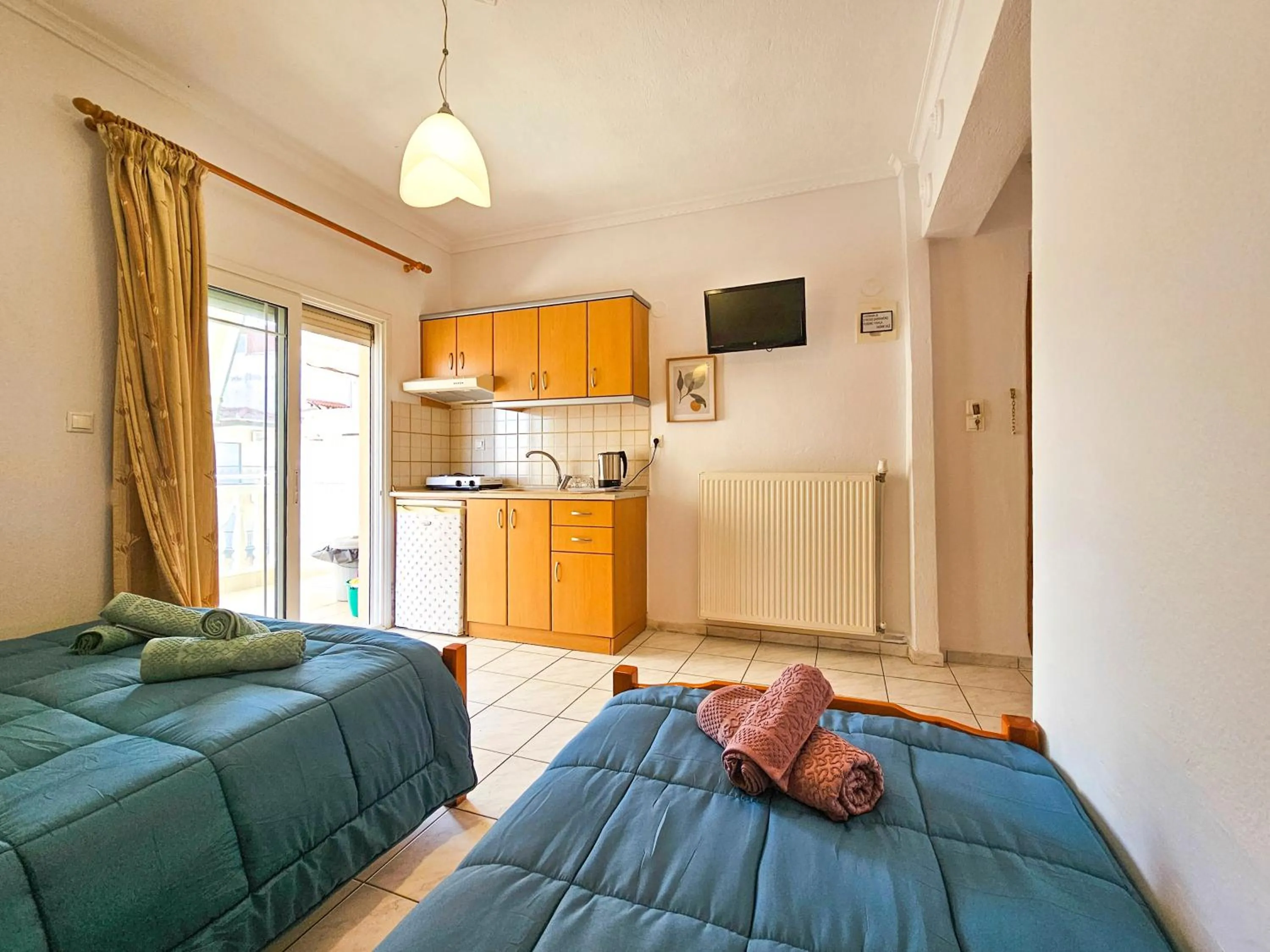 Bed in Hotel Exarhos