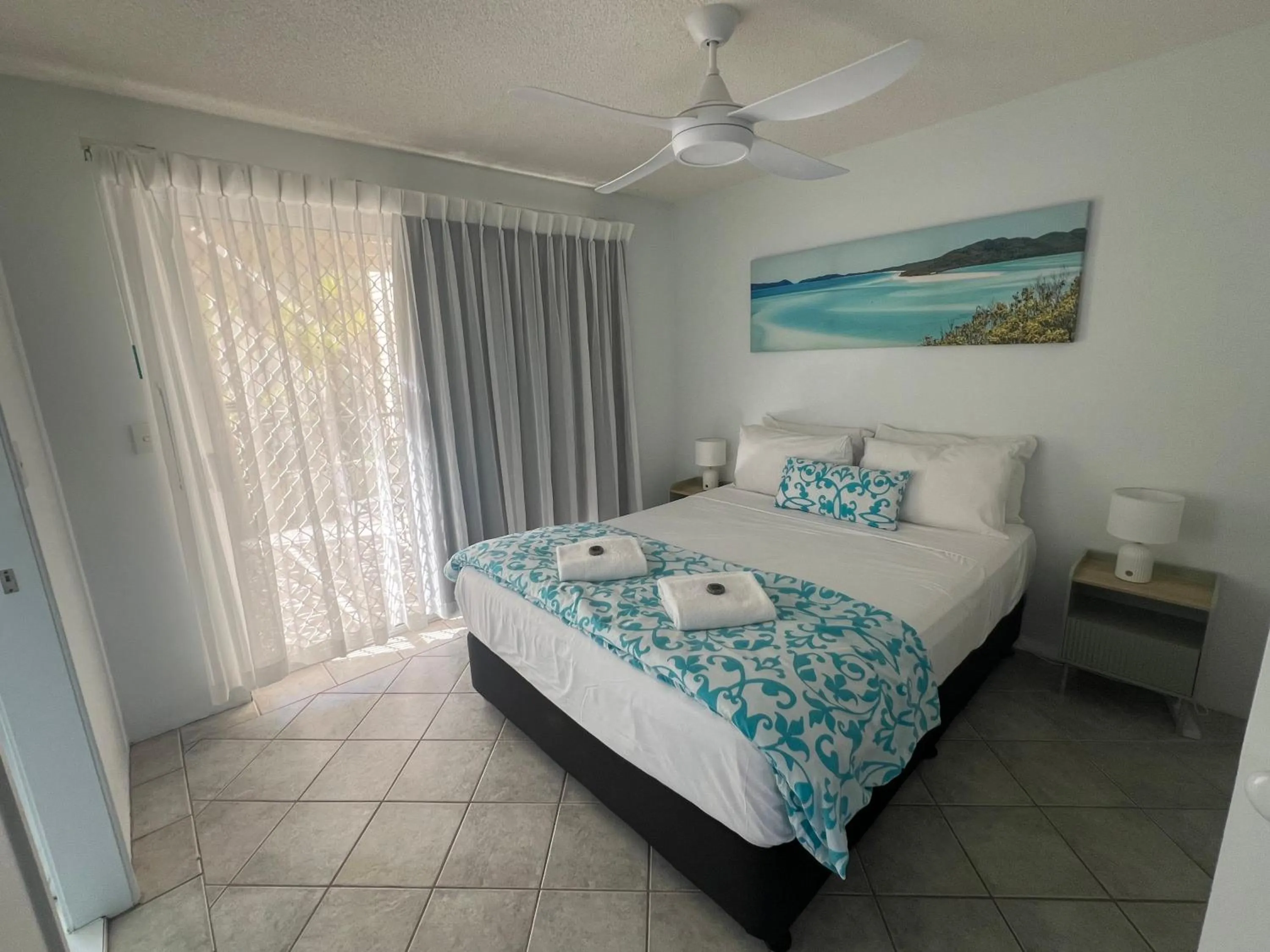 Bed in Excellsior Apartments