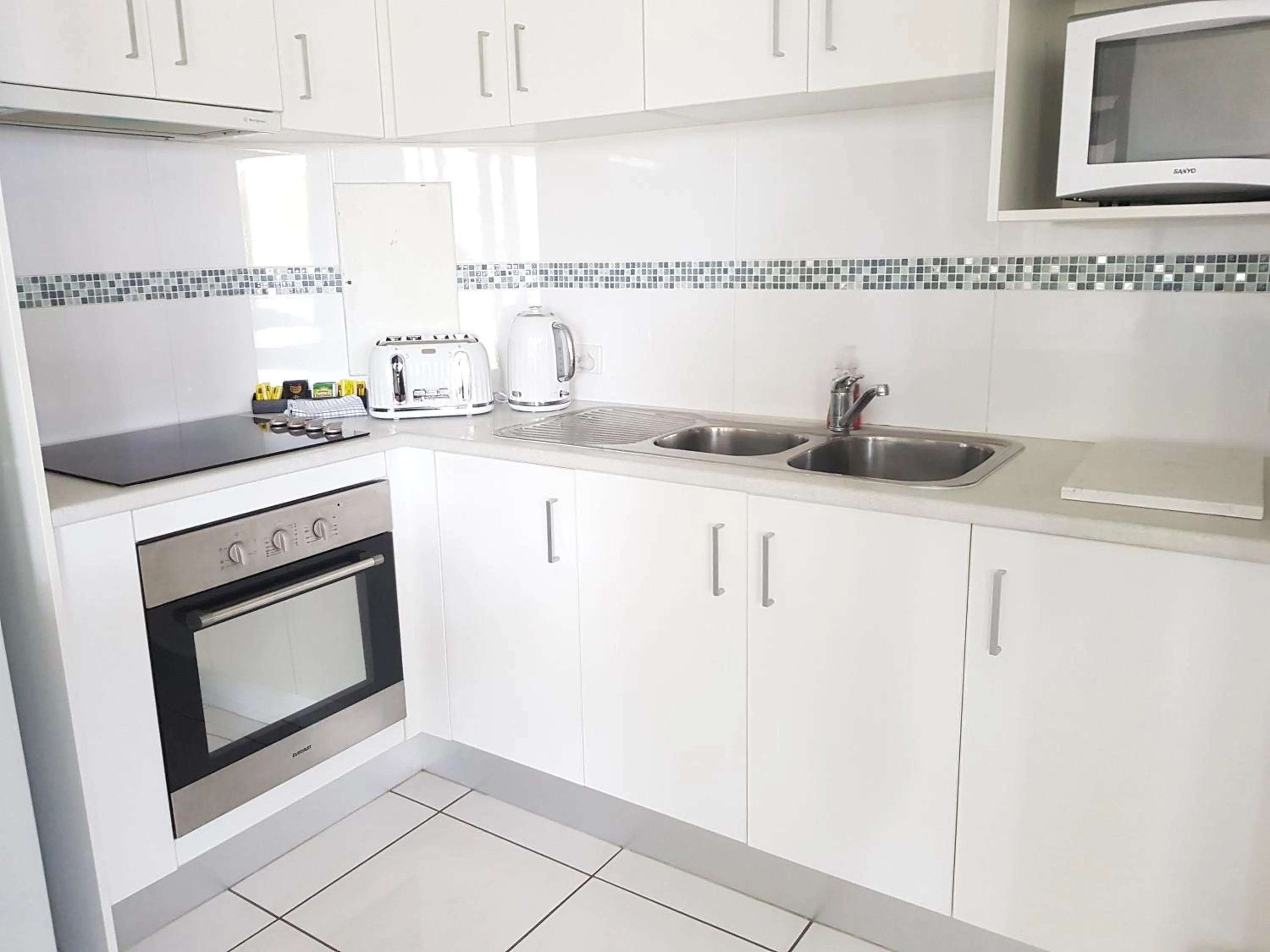 Kitchen or kitchenette in Excellsior Apartments