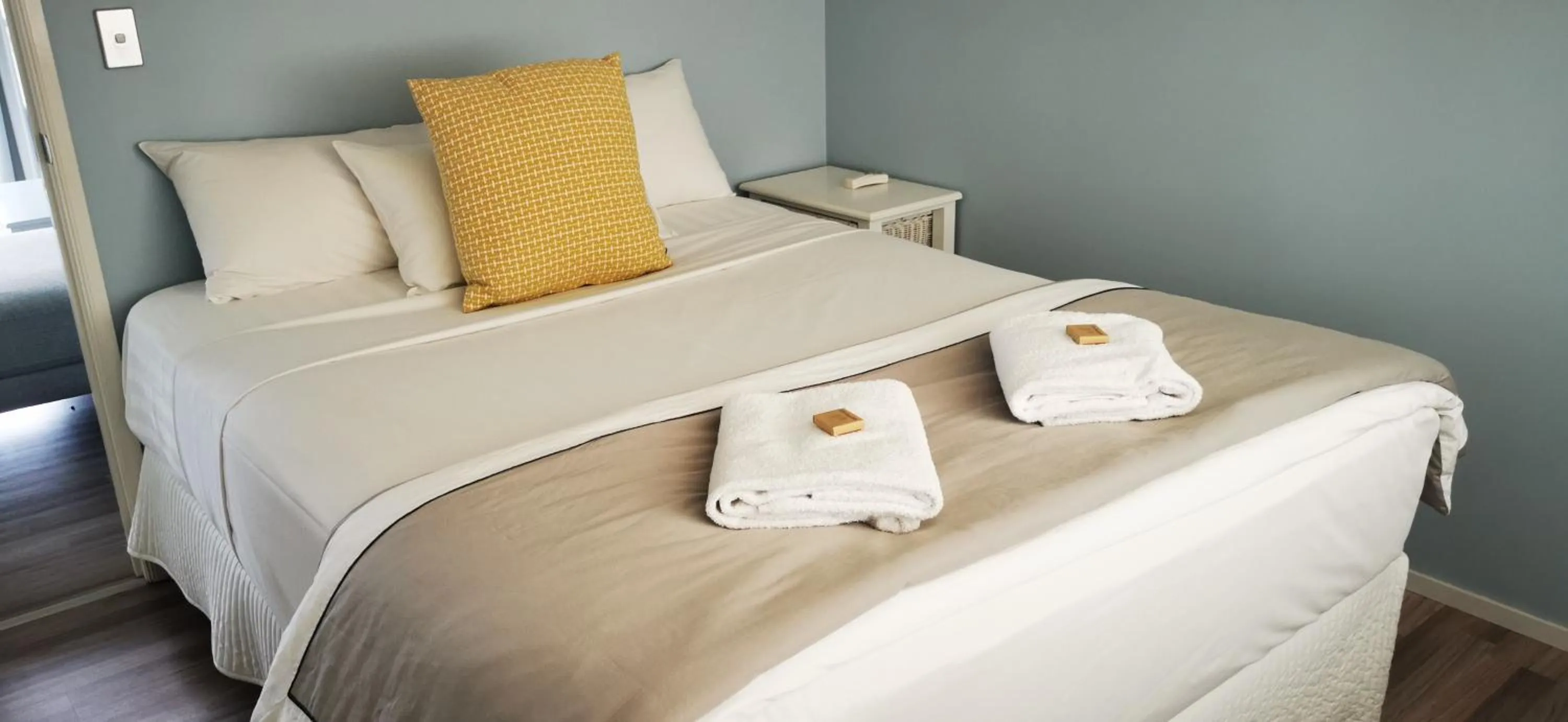 Bed in Excellsior Apartments