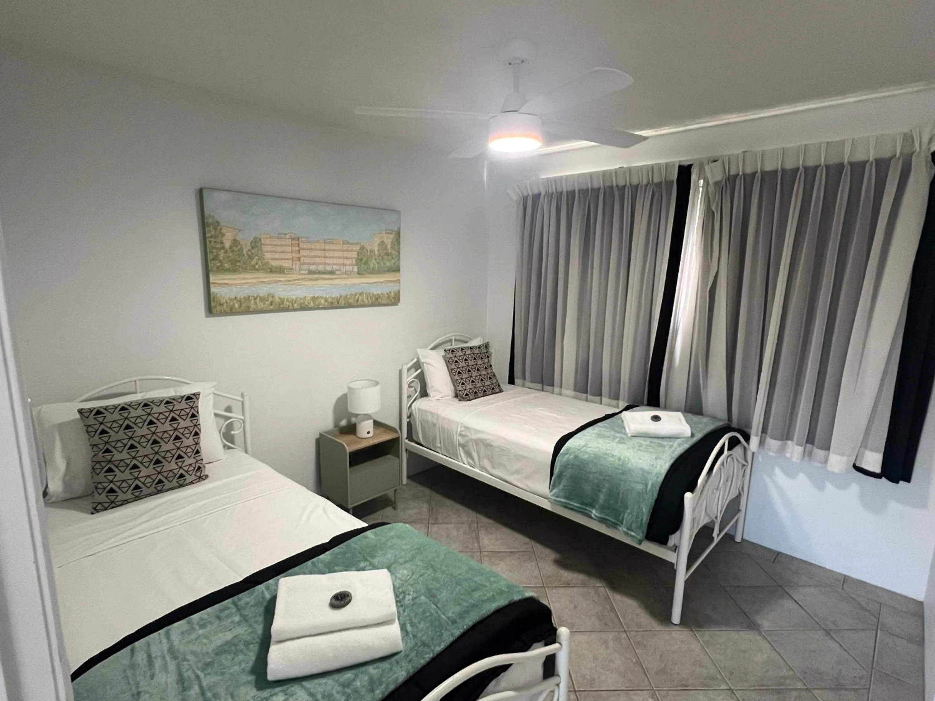 Bed in Excellsior Apartments