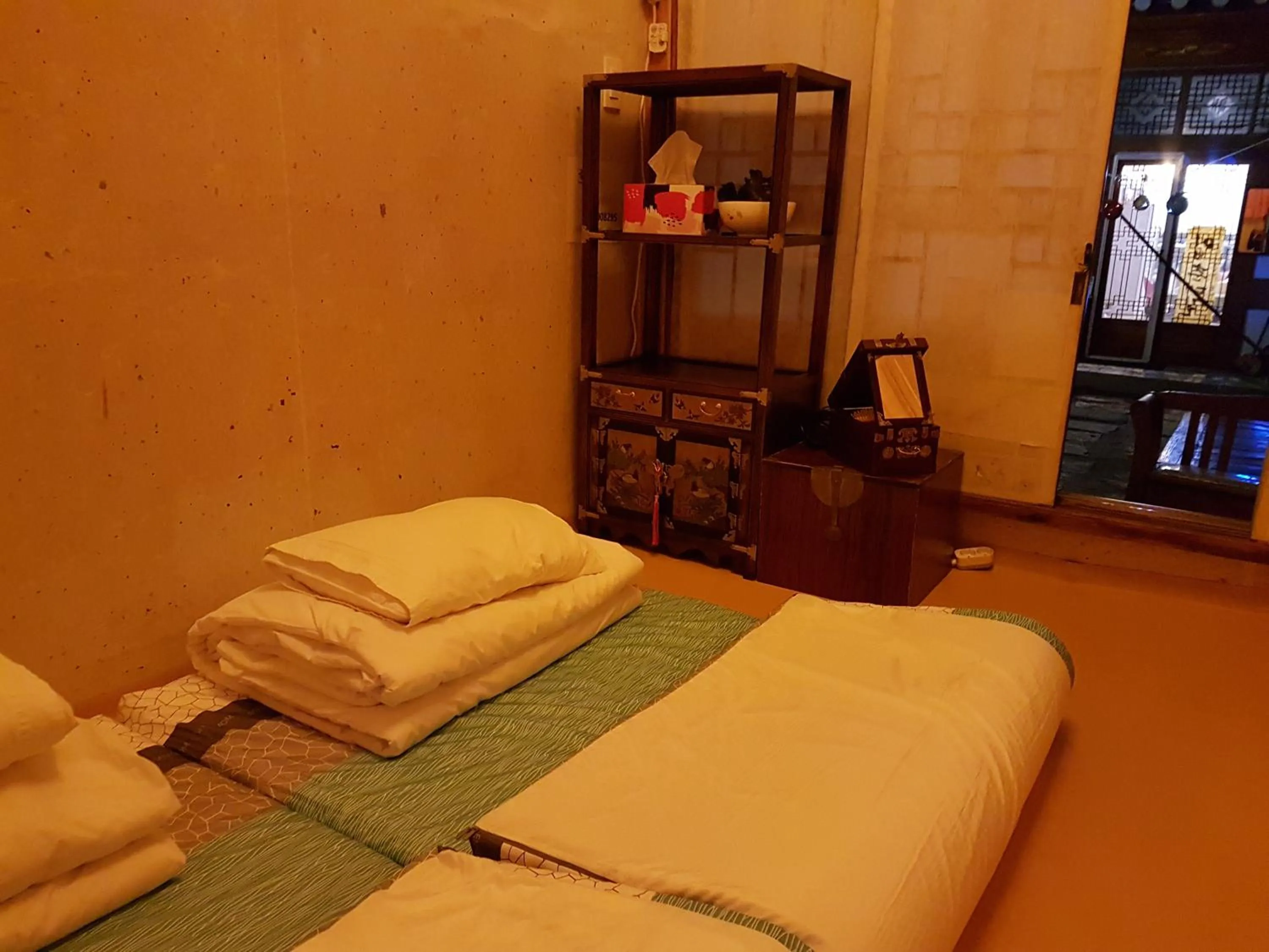 Bed in Gongsimga Hanok Guesthouse