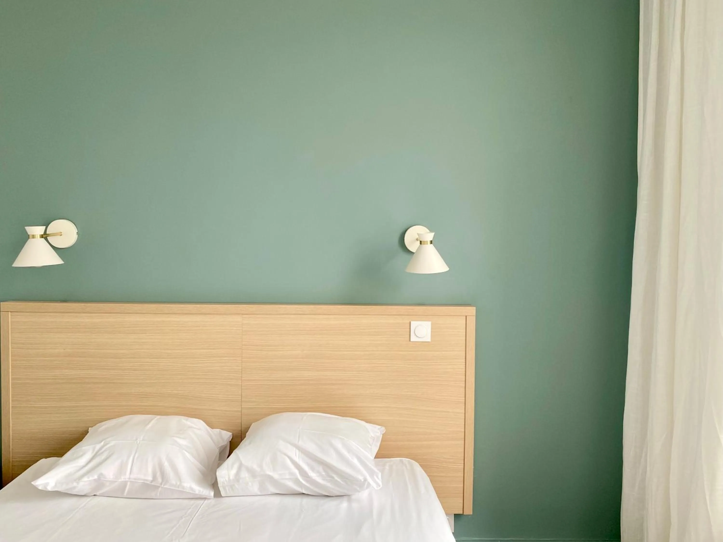 Bed in Hotel Saint Louis