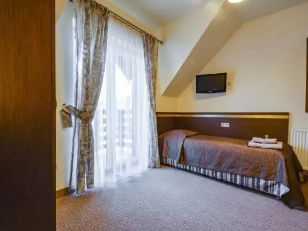 Bed in Hotel Orlik