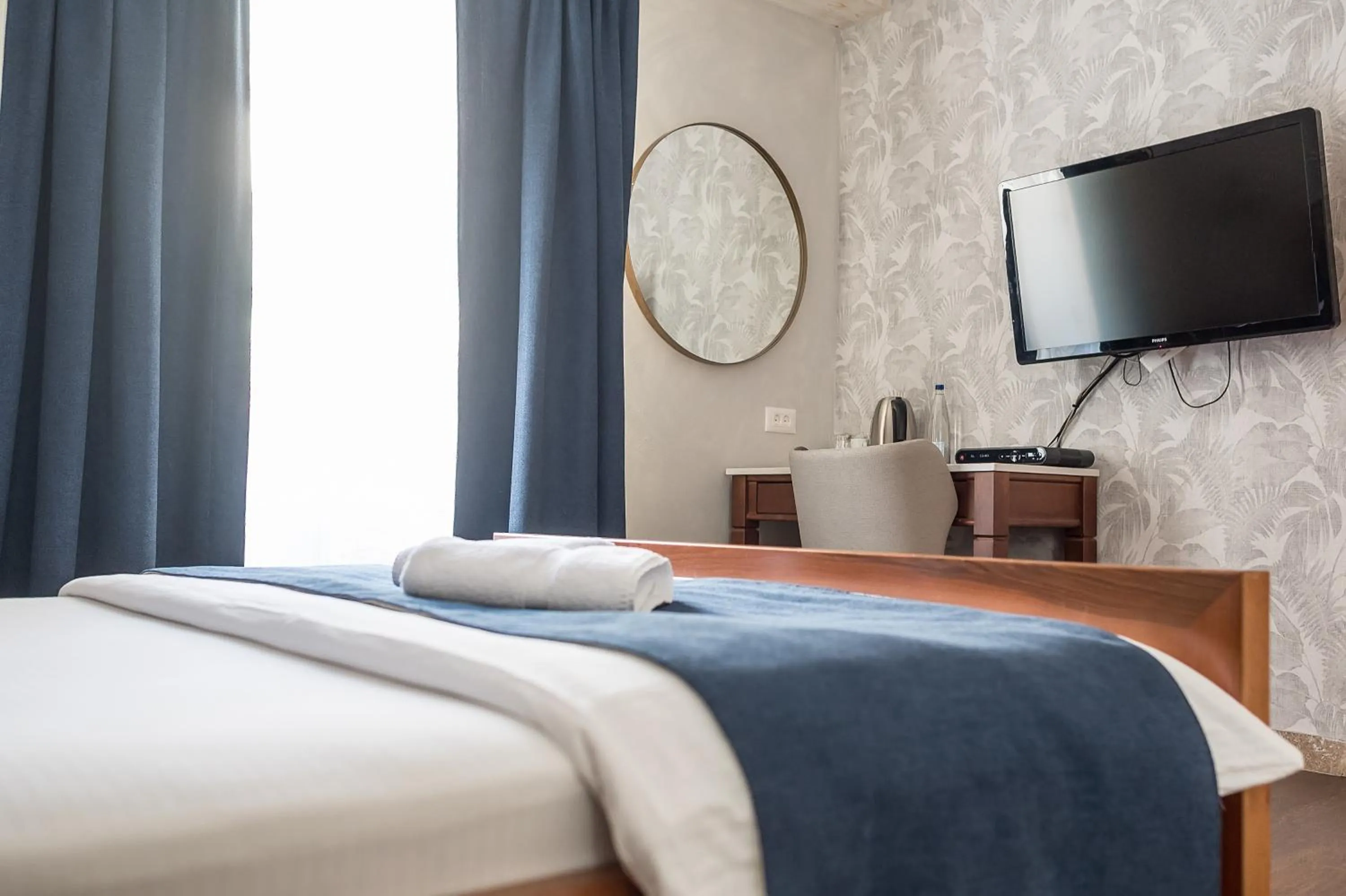 Bed in Conte Hotel & Restaurant