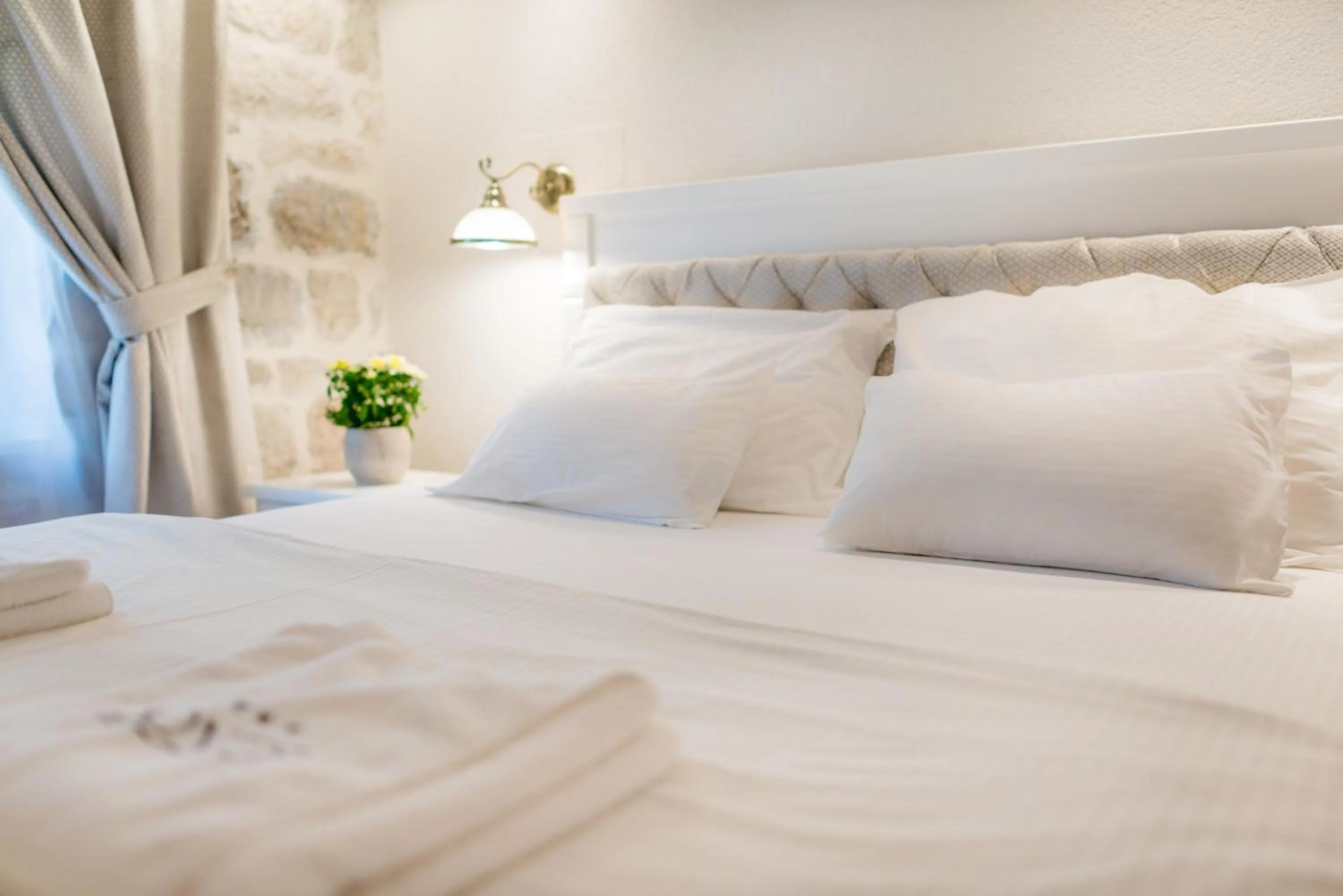 Bed in Conte Hotel & Restaurant