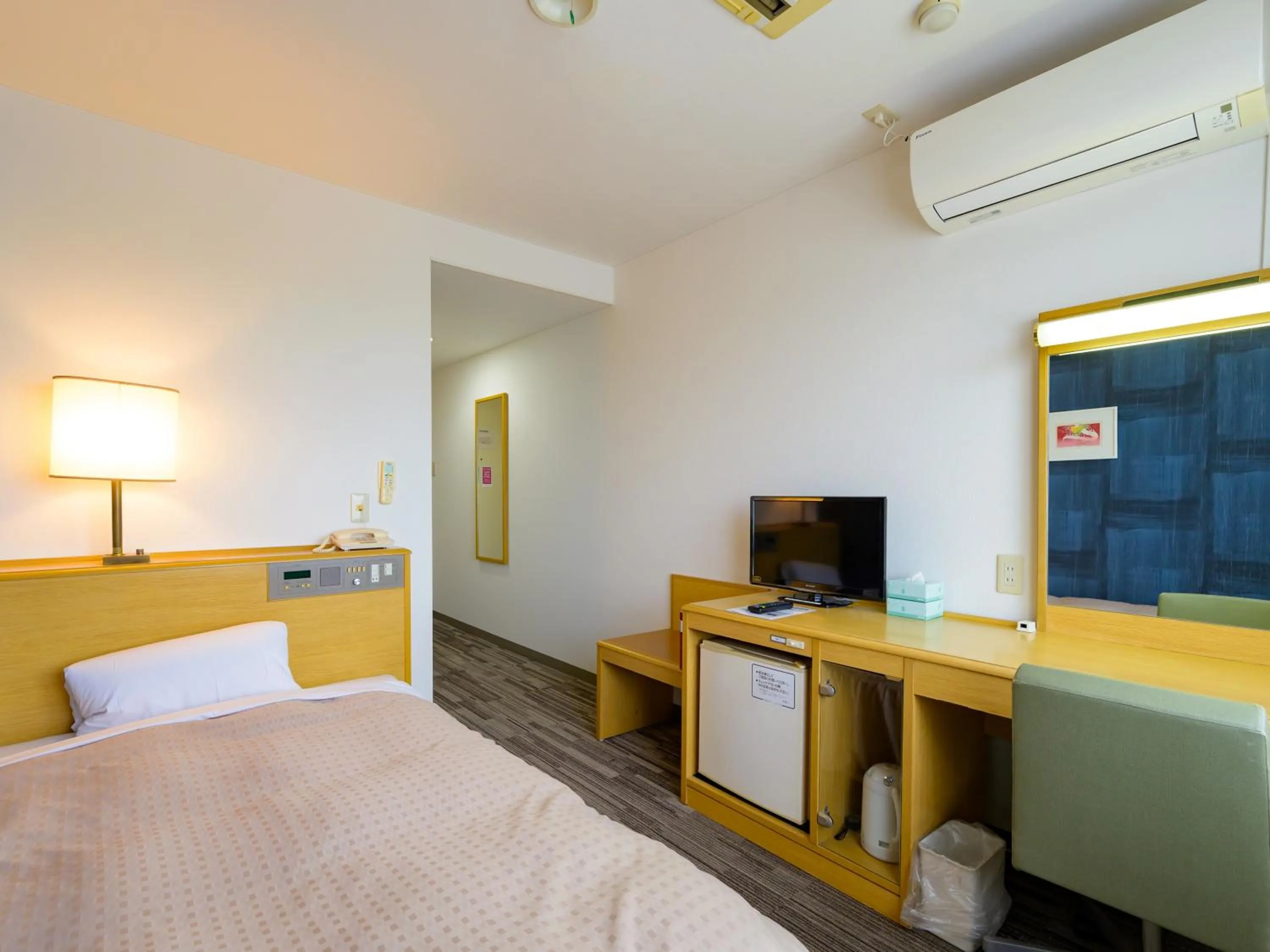 Photo of the whole room, Bed in Hisai Green Hotel