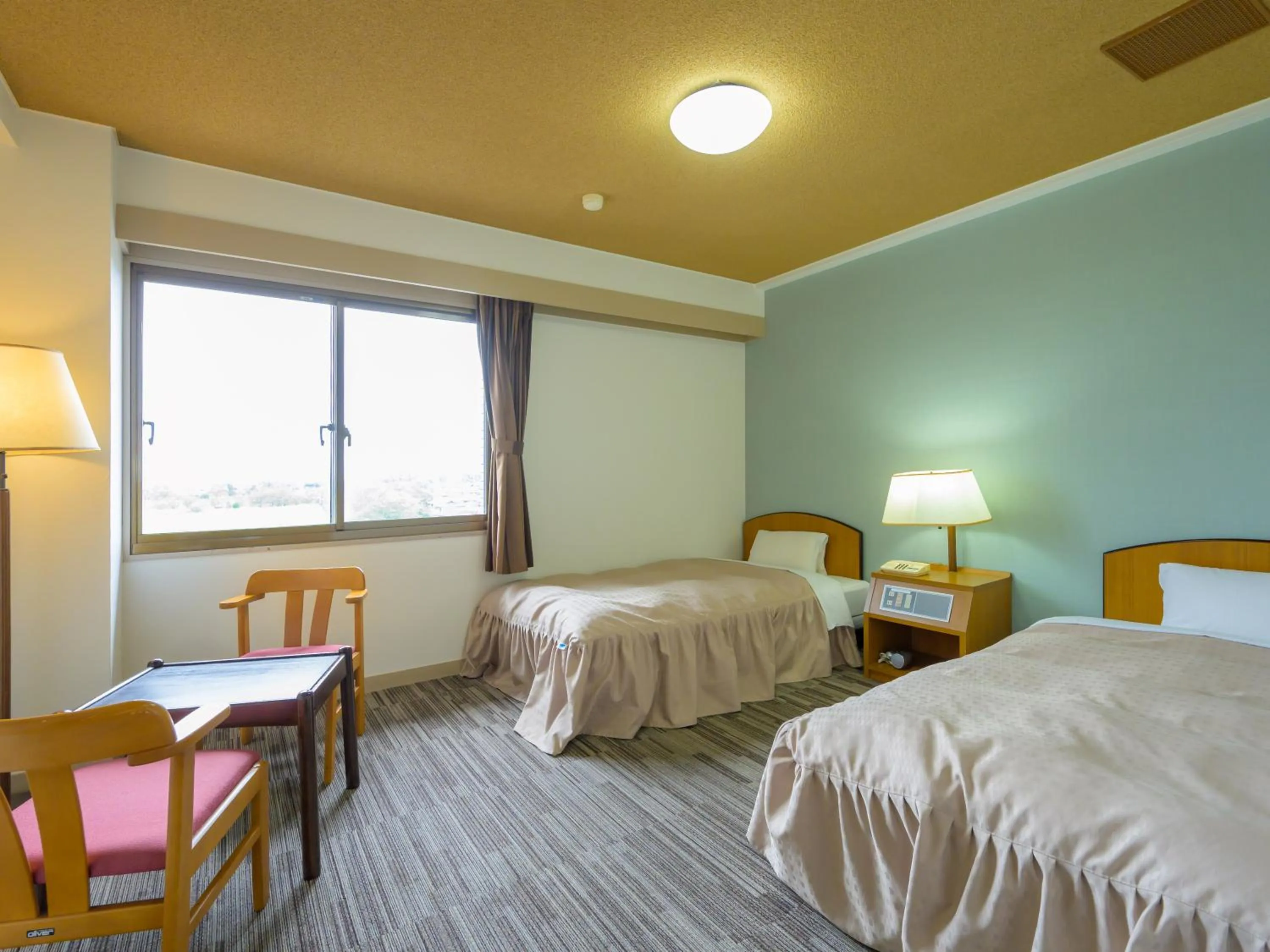 Photo of the whole room, Bed in Hisai Green Hotel