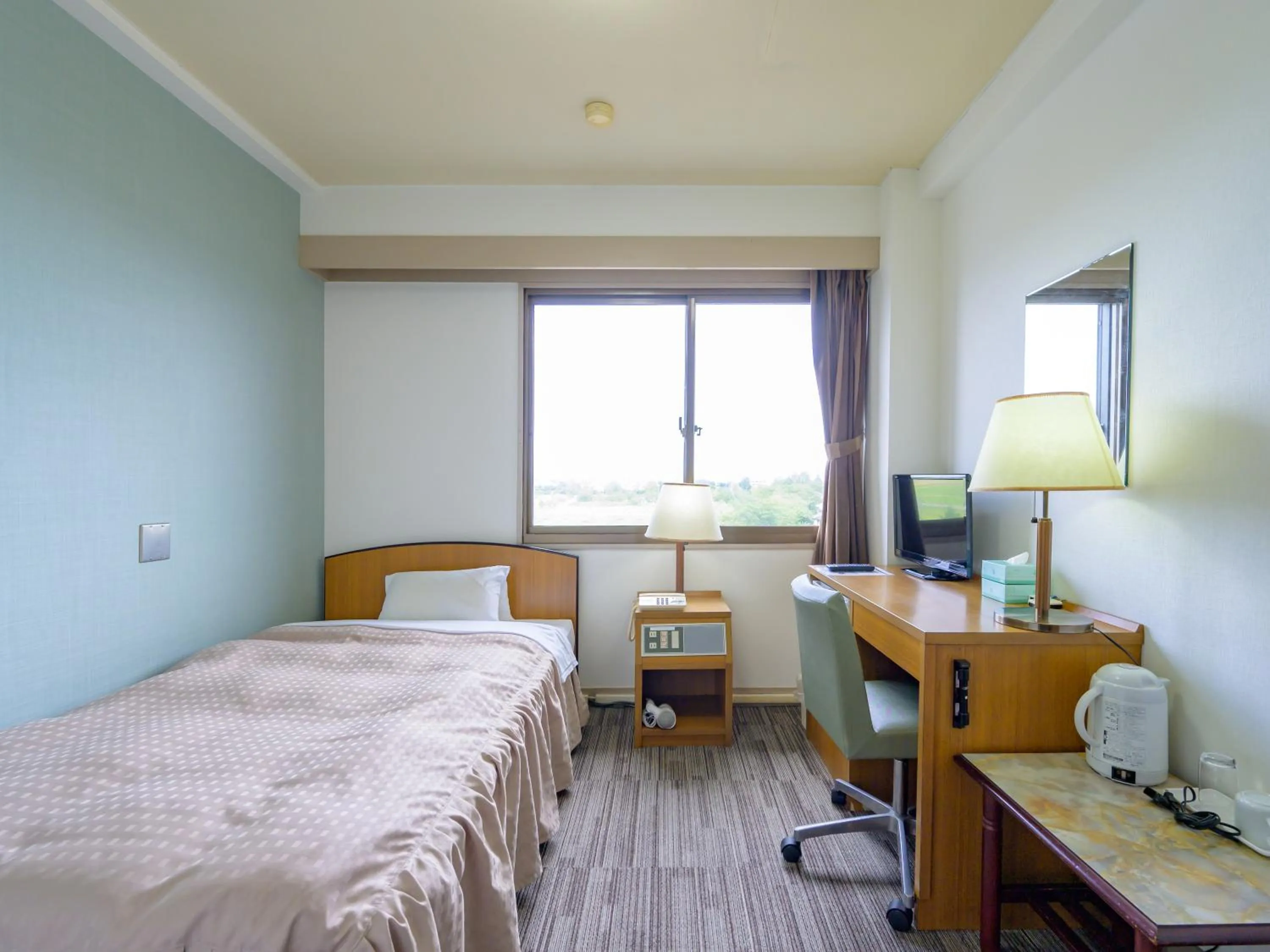 Photo of the whole room, Bed in Hisai Green Hotel